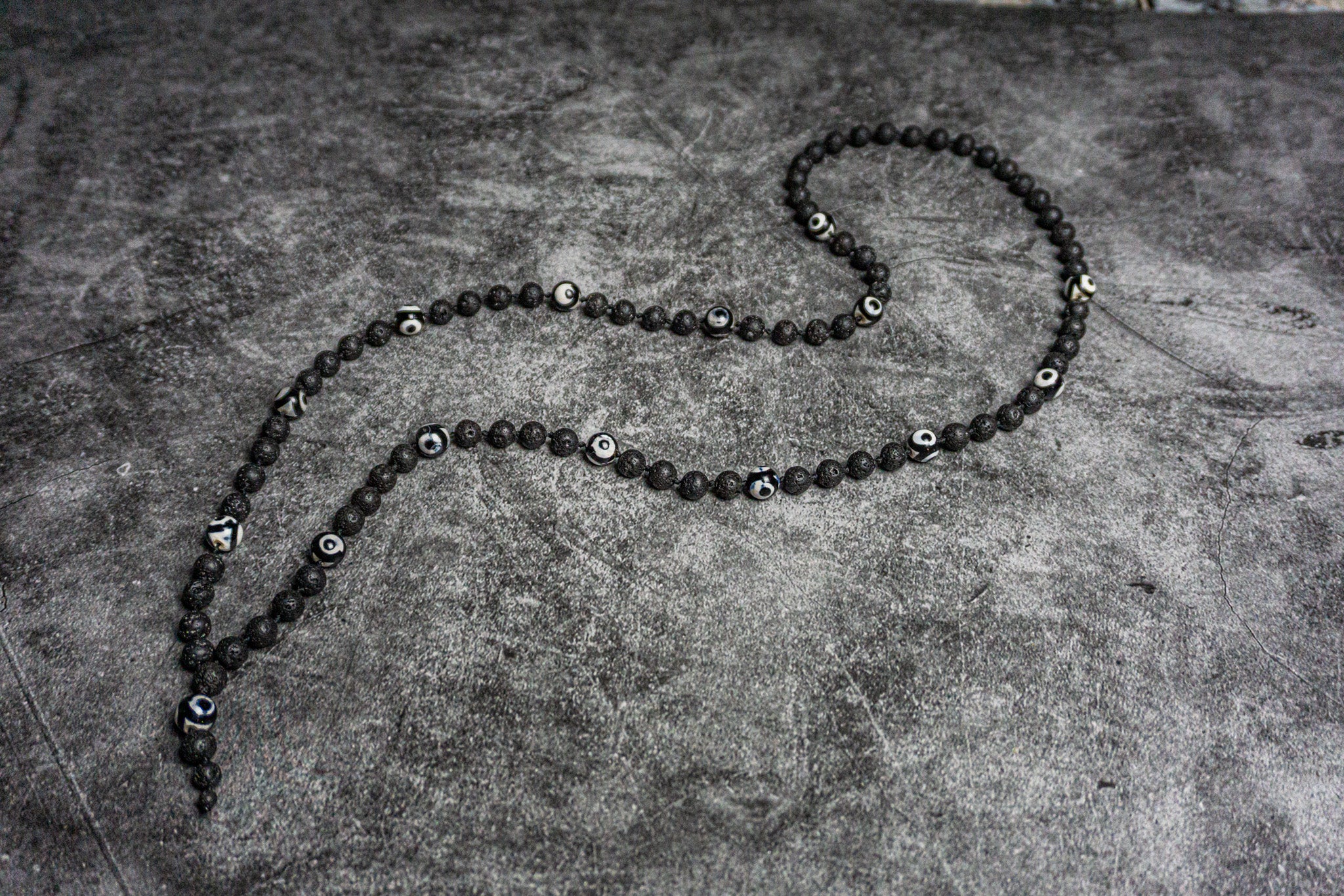 black lava stone mala necklace with third eye tibetan agate - wander jewellery