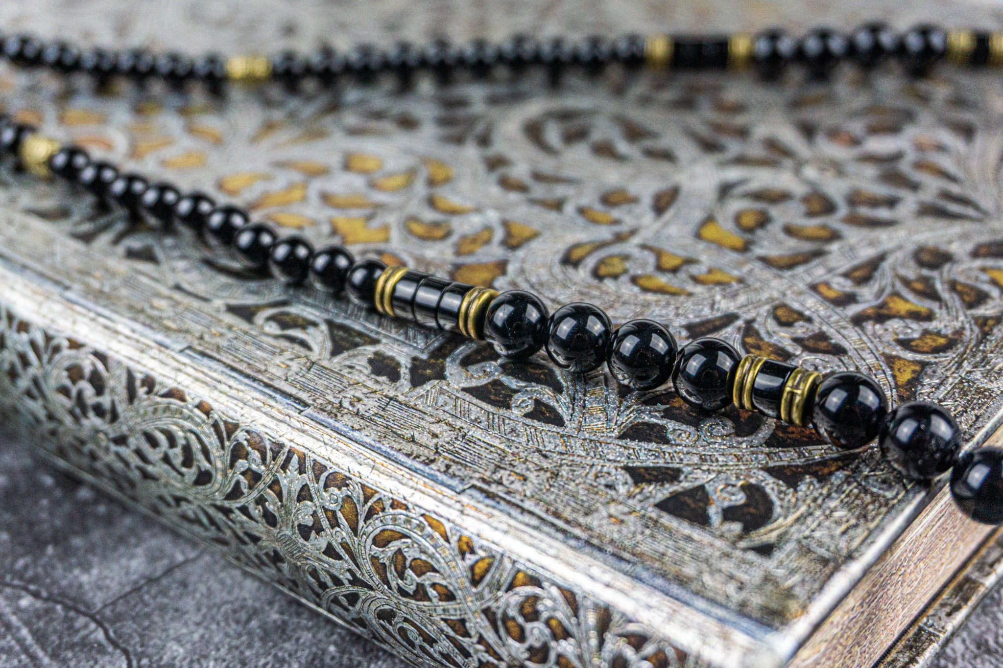 black onyx and antique gold long elegant necklace with ideogram - wander jewellery