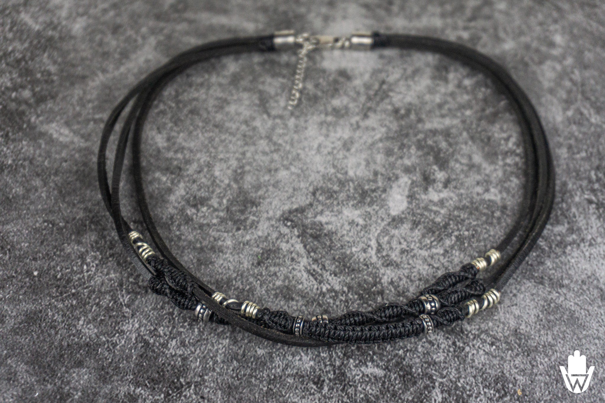 black leather necklace with silver deaiils