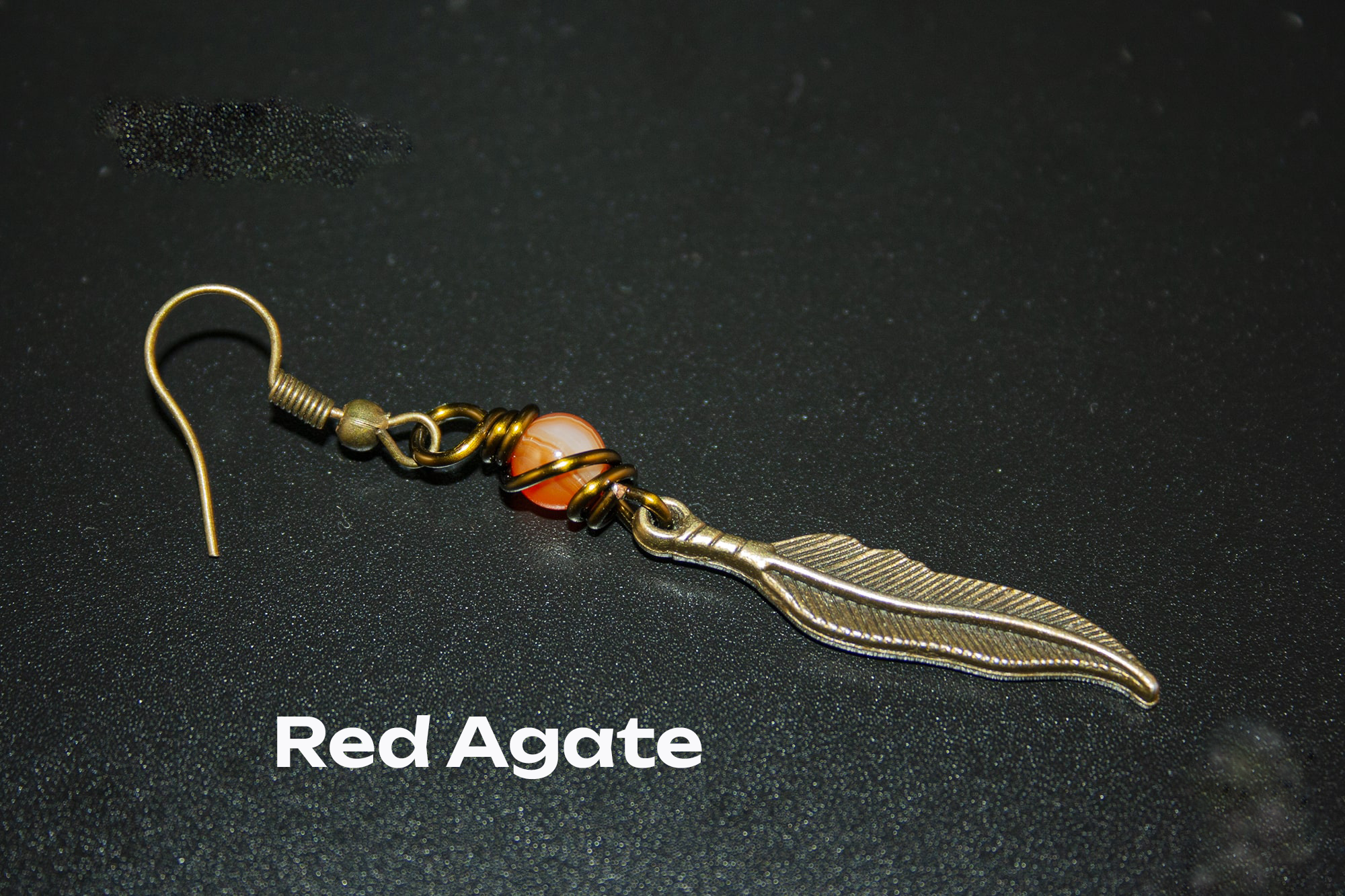bronze dangle feather earring with red agate gemstone- wander jewellery