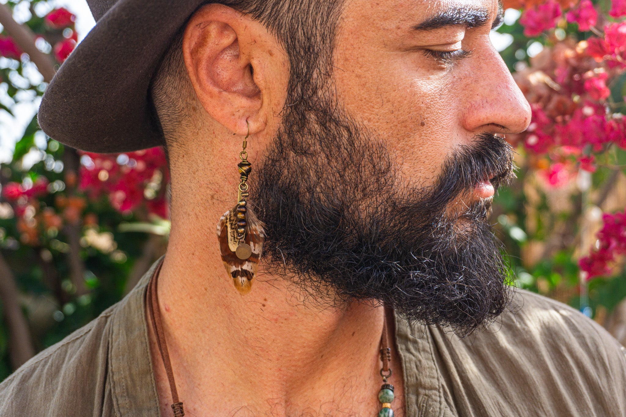 mens pirate beaded feather dangle earring with tiger eye