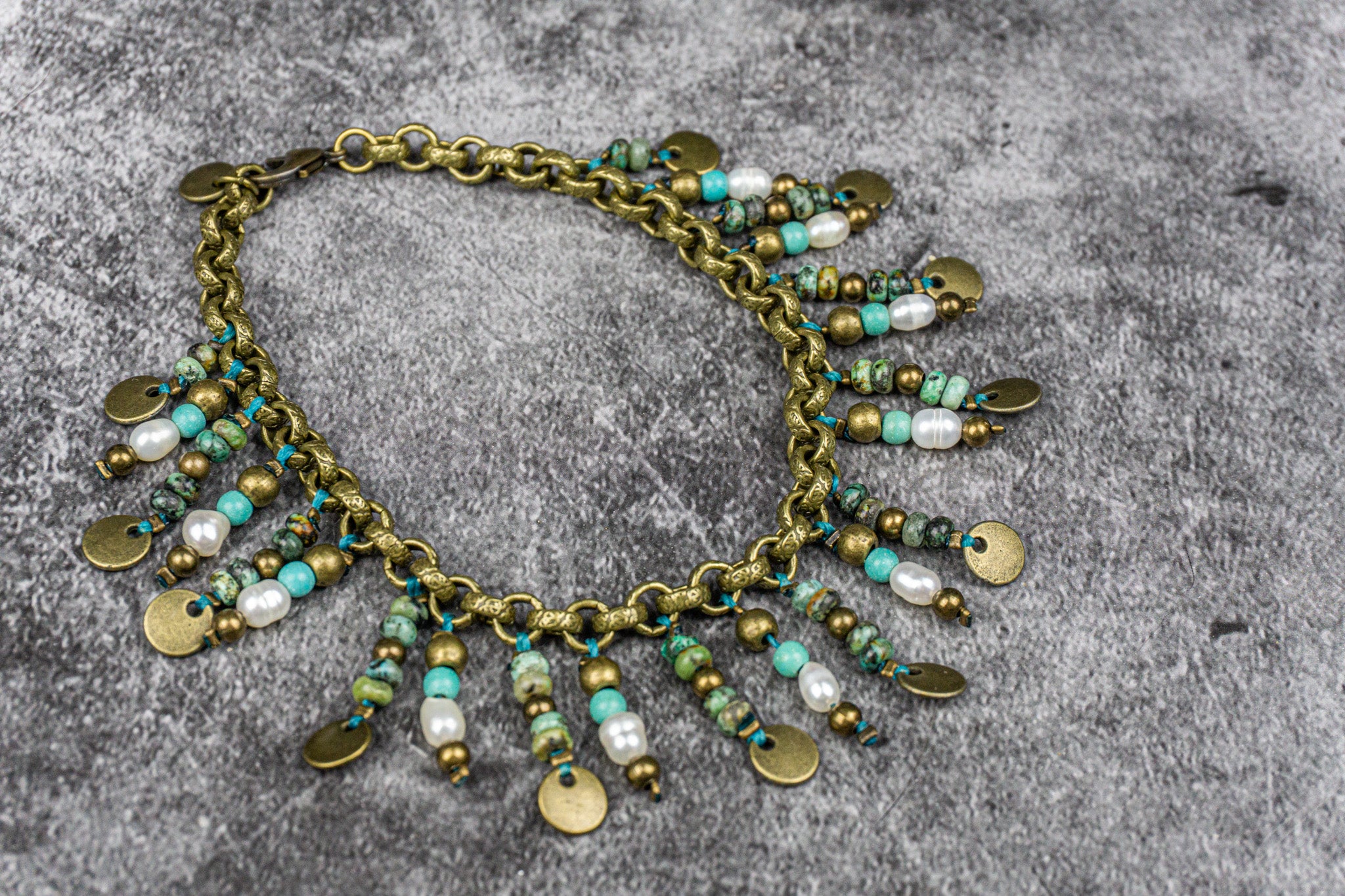 Gemstone beaded charms anklet with African turquoise jasper, pearls, and brass coins, perfect for a boho-chic look – Wander Jewellery