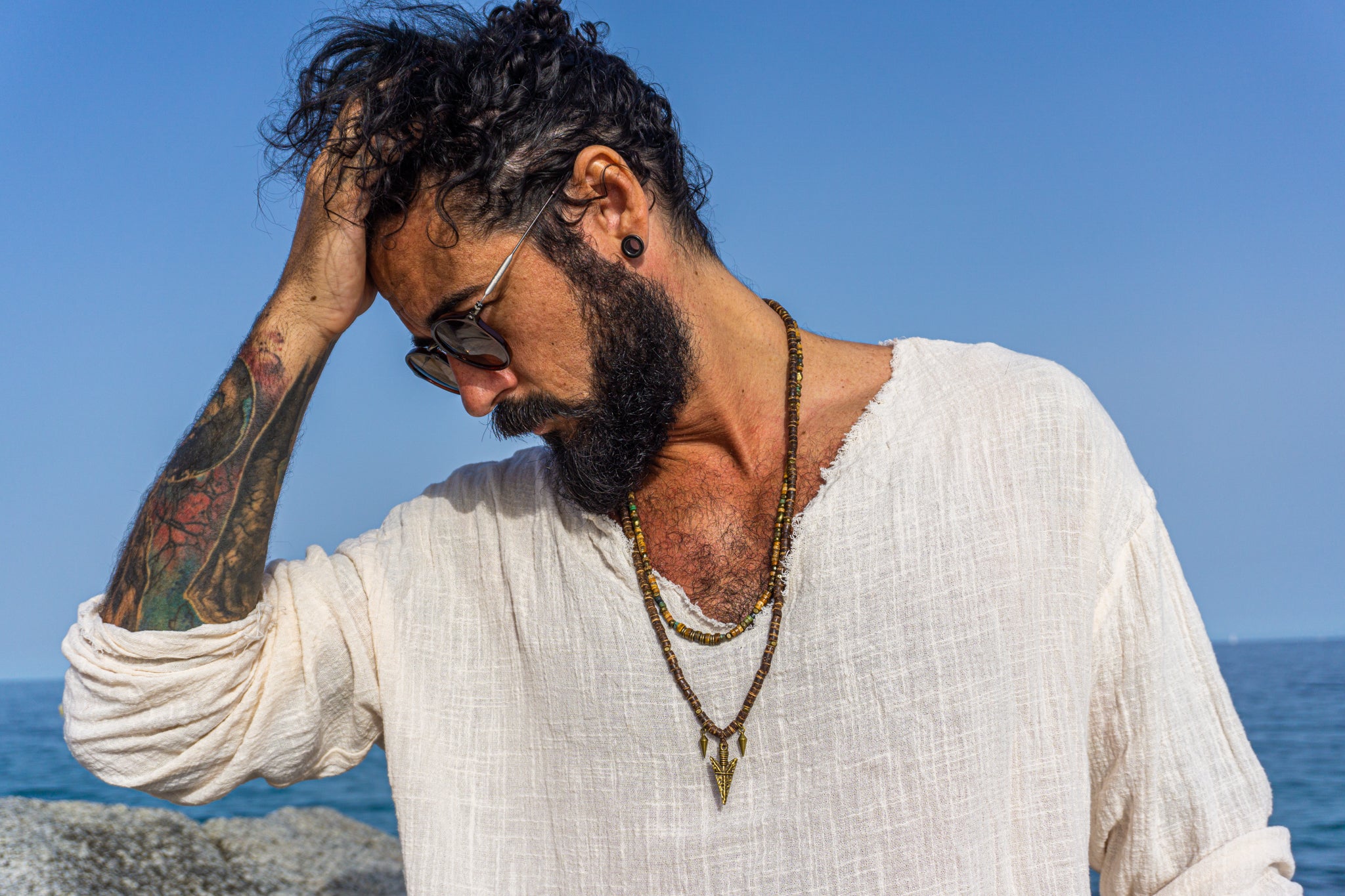 mens double necklace set made of jasper and tiger eye, plus a coconut necklace with and arrowhead pendant- wander jewellery