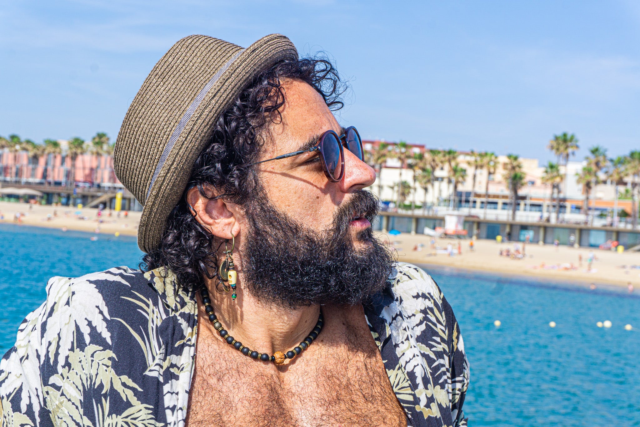 men black golden obsidian beaded necklace with brass and rudraksha seed as central piece- wander jewellery