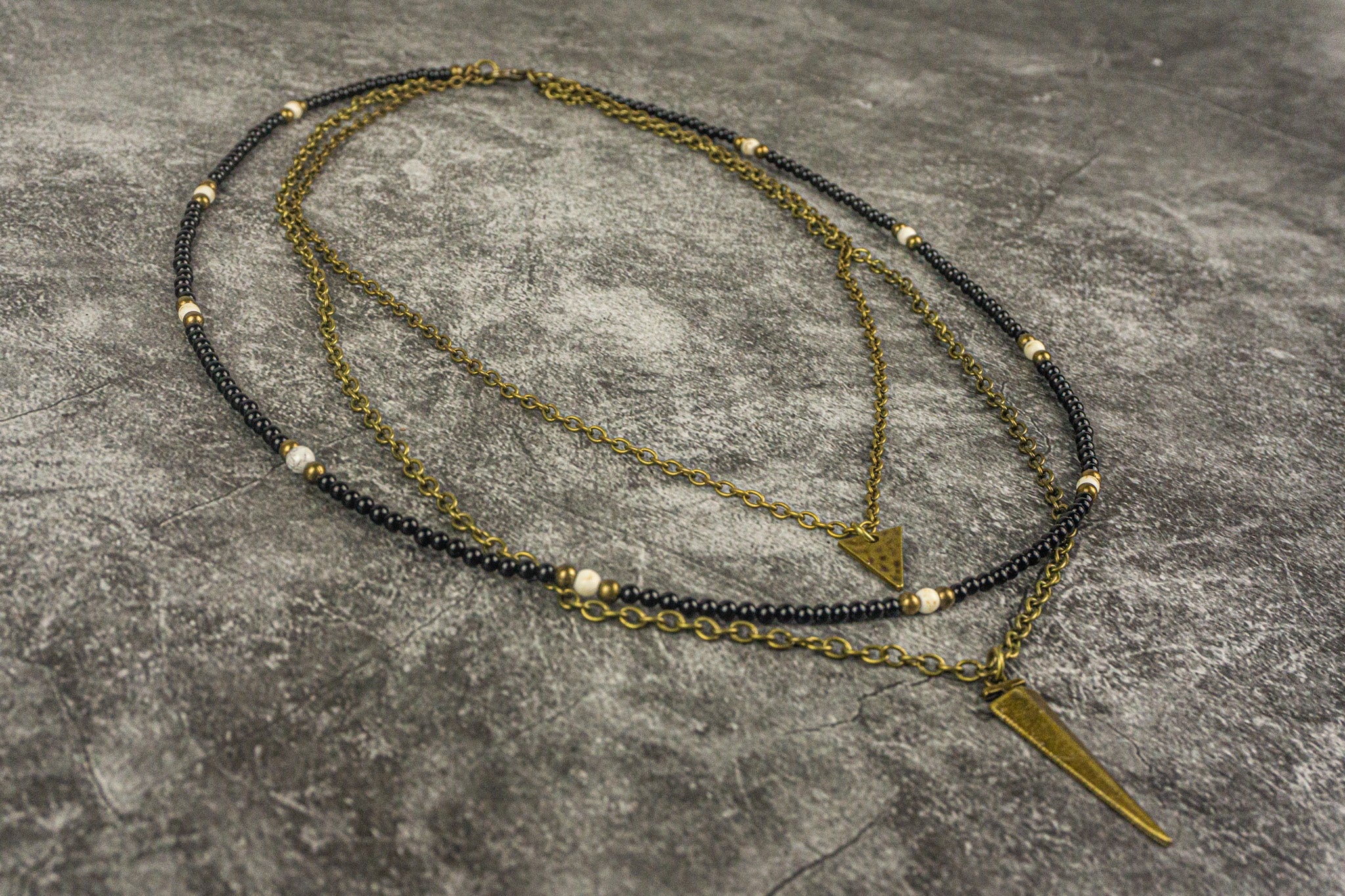 layered chain necklace black onyx beaded layer and triangle and dagger pendant- wander jewellery