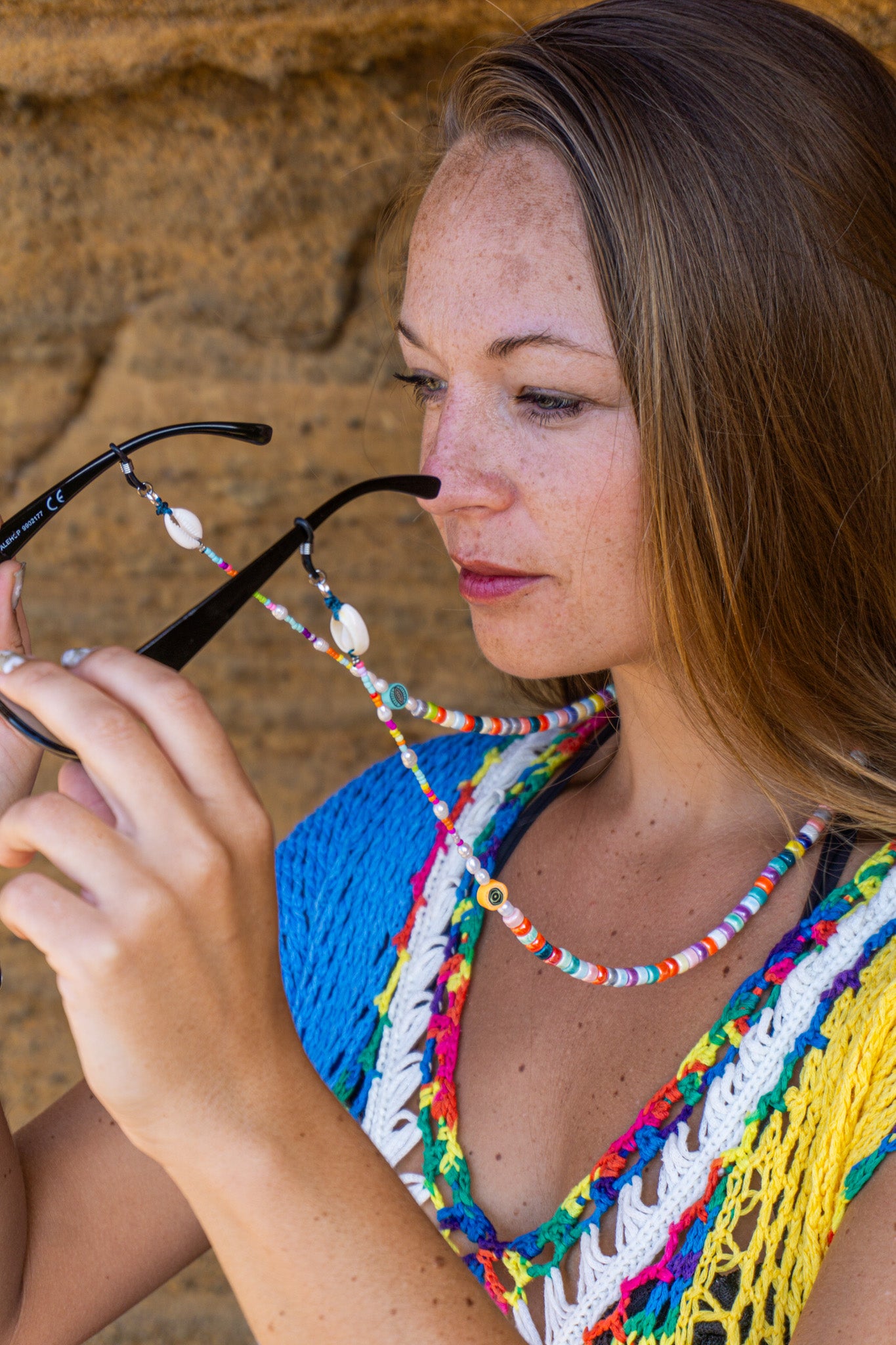 Colorful porcelain and pearl glasses chain with cowrie shells for a unique, summery accessory for women – Wander Jewellery