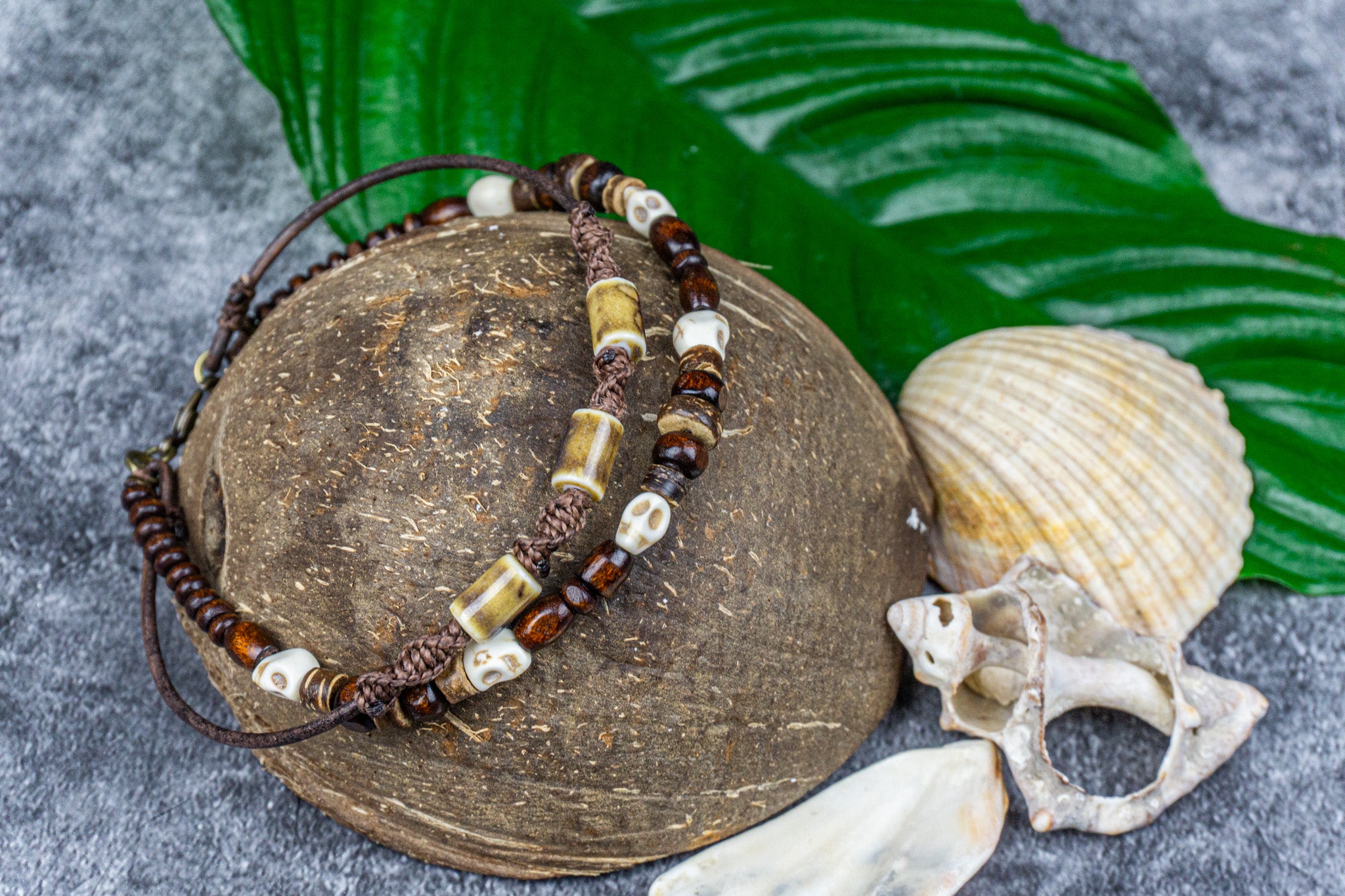 Stylish anlet set with skull beads, leather, and wood, designed for a boho-pirate look – Wander Jewellery