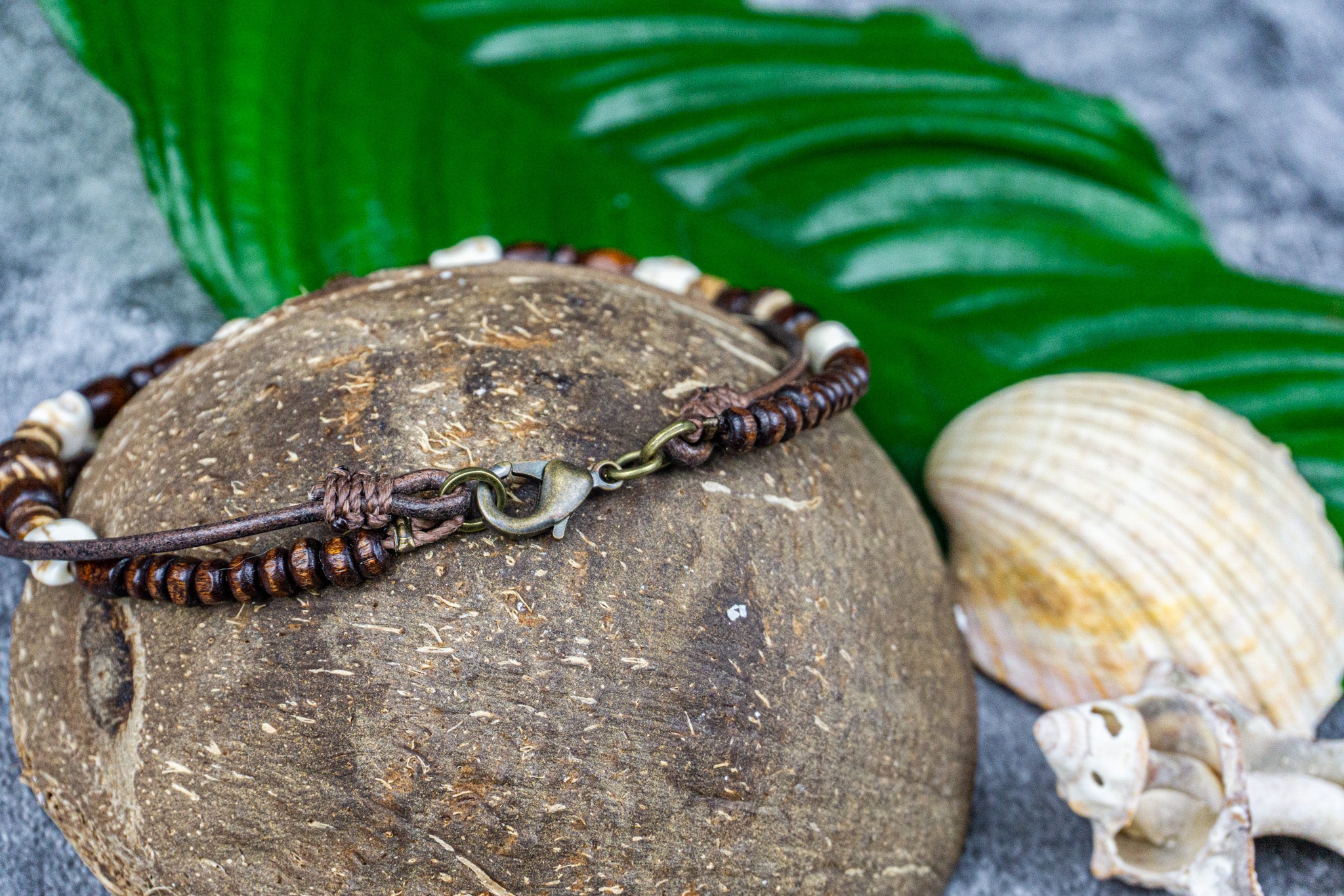 Boho pirate skull anklet for men with leather, ceramic beads, and wooden details wit a brass lobster claw closure – Wander Jewellery
