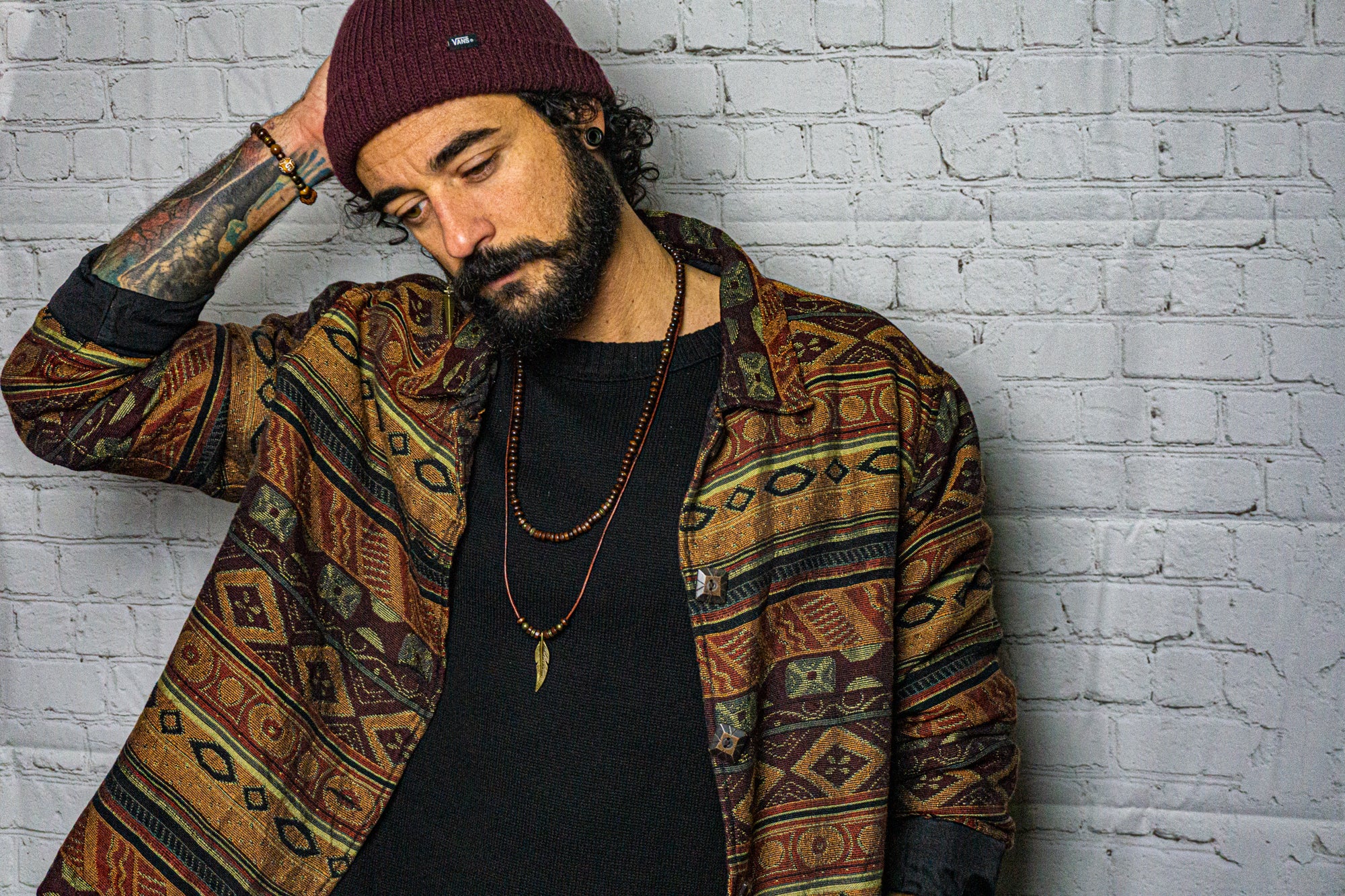 mens layered necklace set made of a wooden bead necklace and a leather necklace with a bronze feather as a pendant- wander jewellery