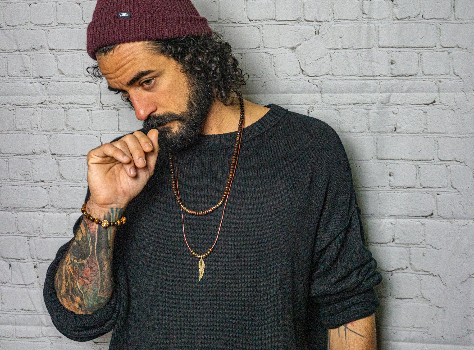 mens layered necklace set made of a wooden necklace and a leather necklace with a bronze feather as a pendant- wander jewellery