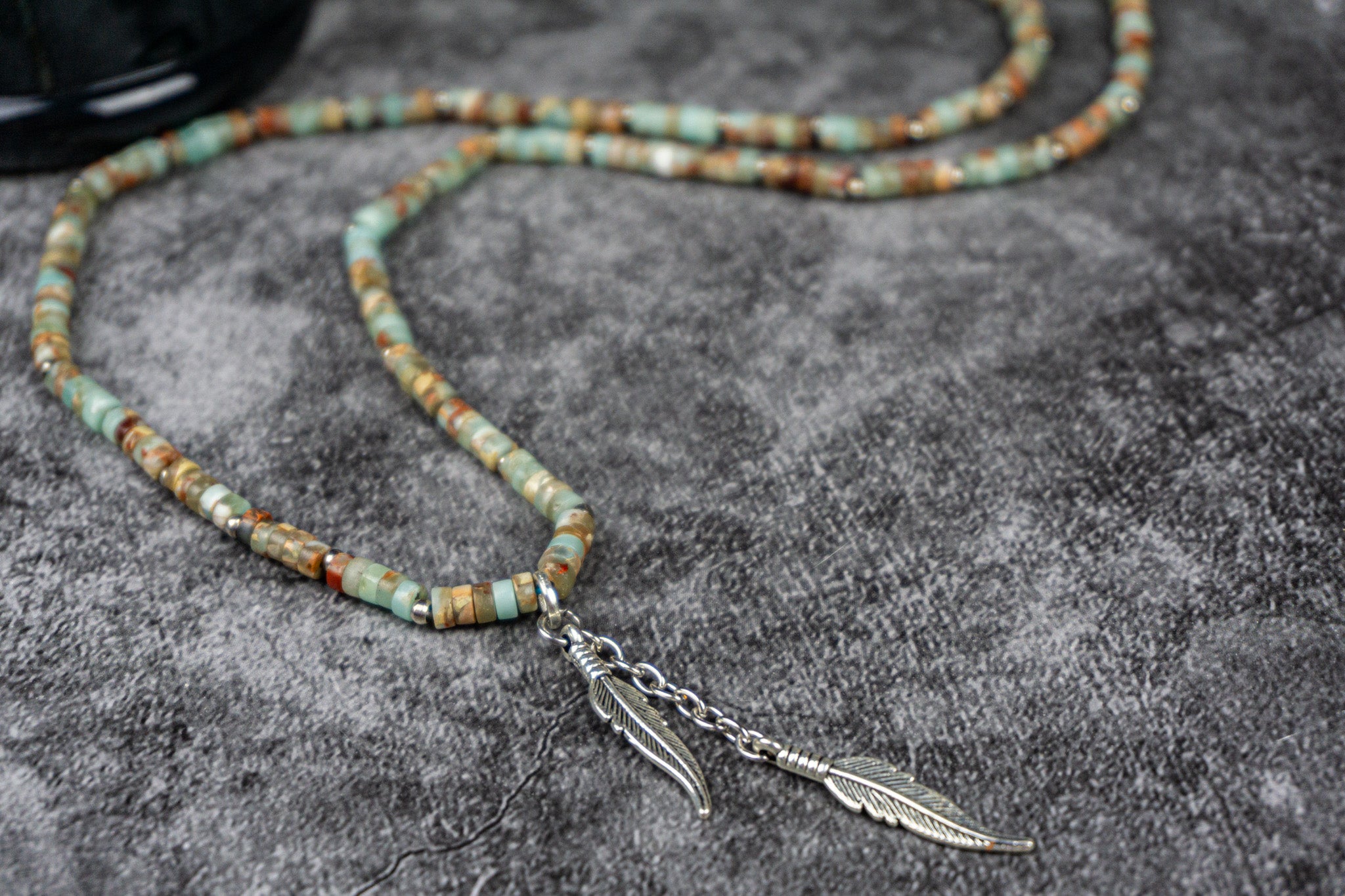 long heishi bead gemstone necklace with silver feathers charms- wander jewelley