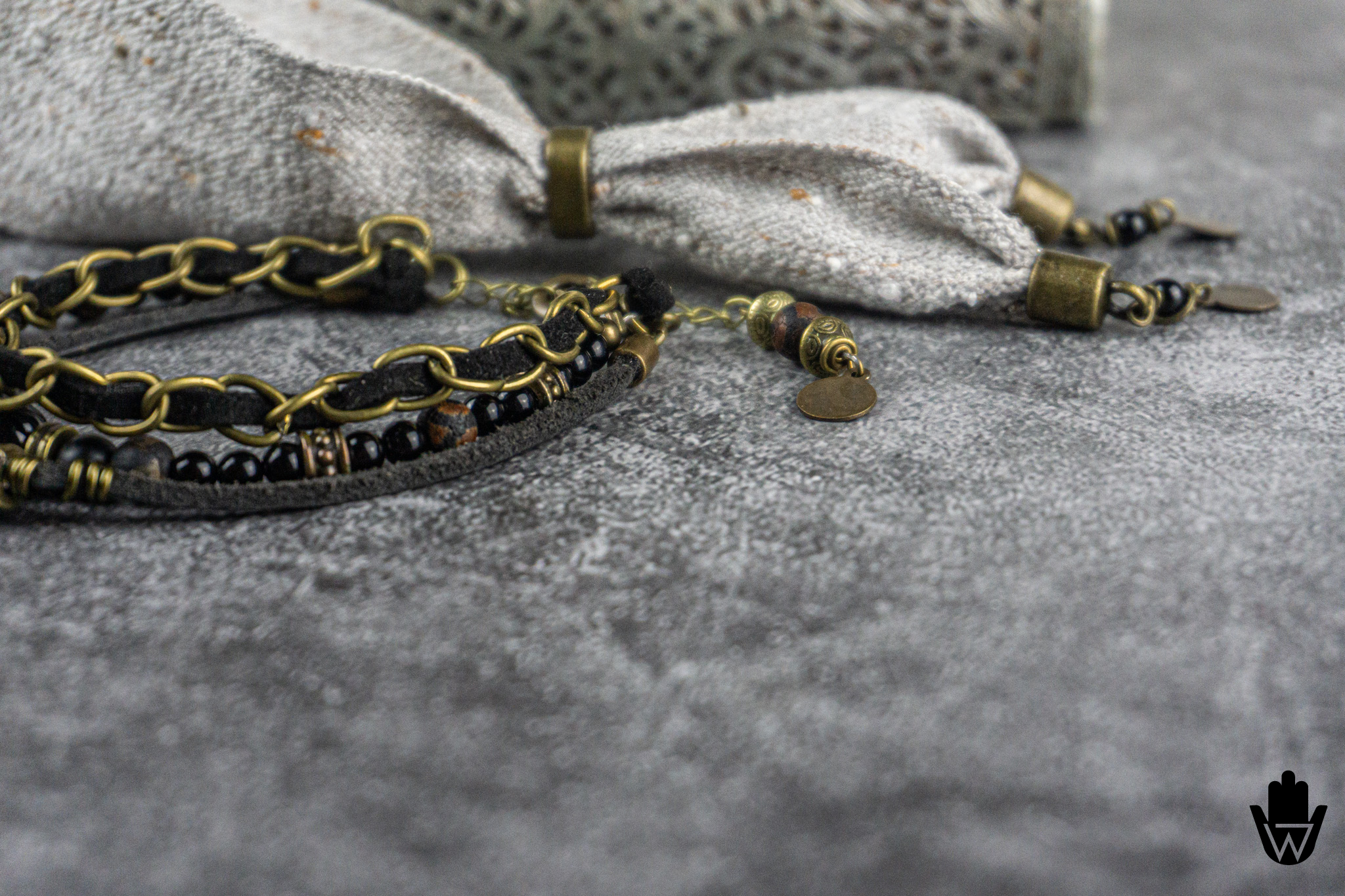 black and bronze boho wrap bracelet set made of black onyx and agate, leather, faux leather and bronze chain, bronze coin charm and a vintage gray cuff cloth- wanderjewellery