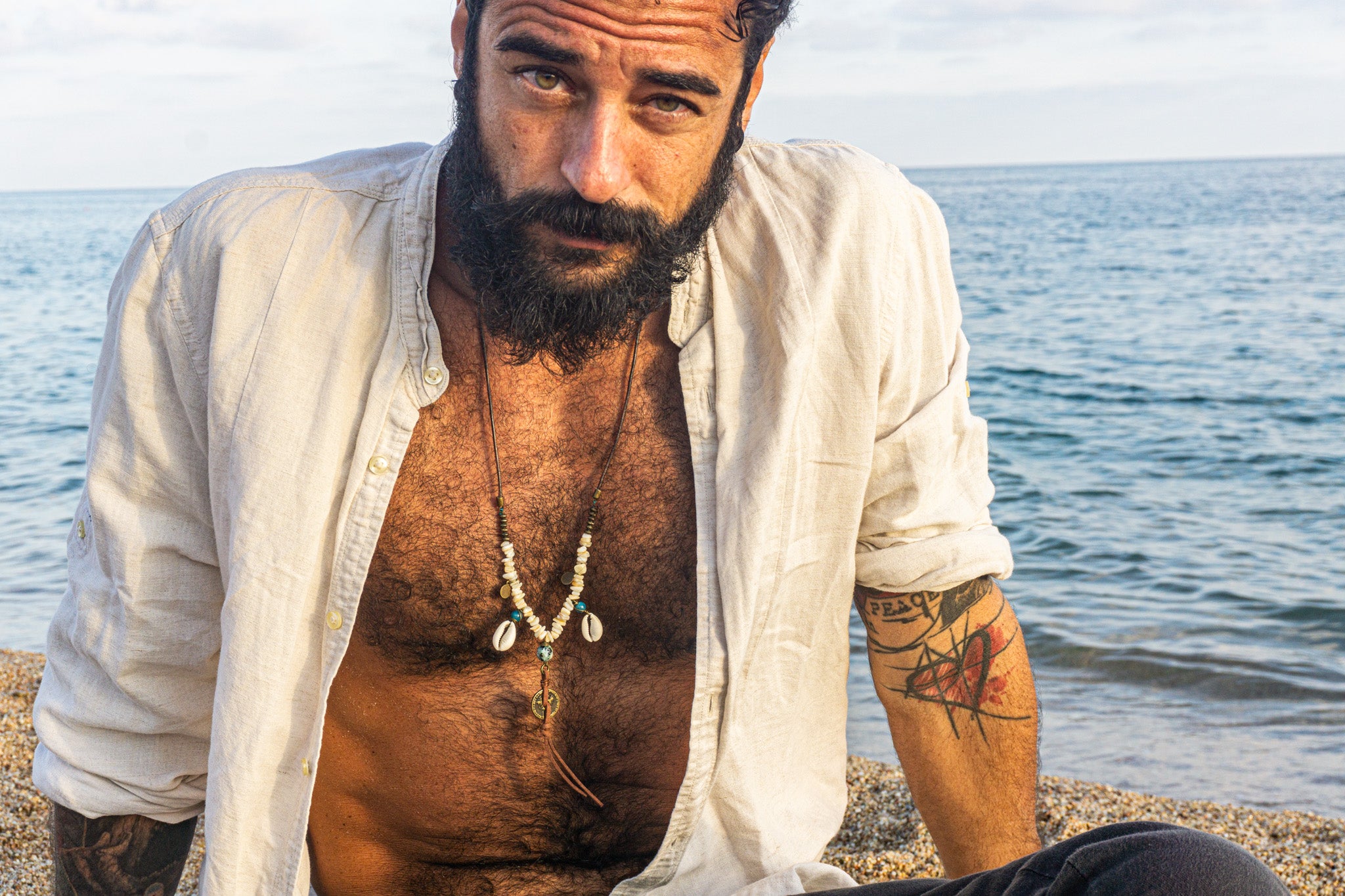 mens long leather beaded necklace made of brass beads and white coral , with coin and shell charms-wander jewellery