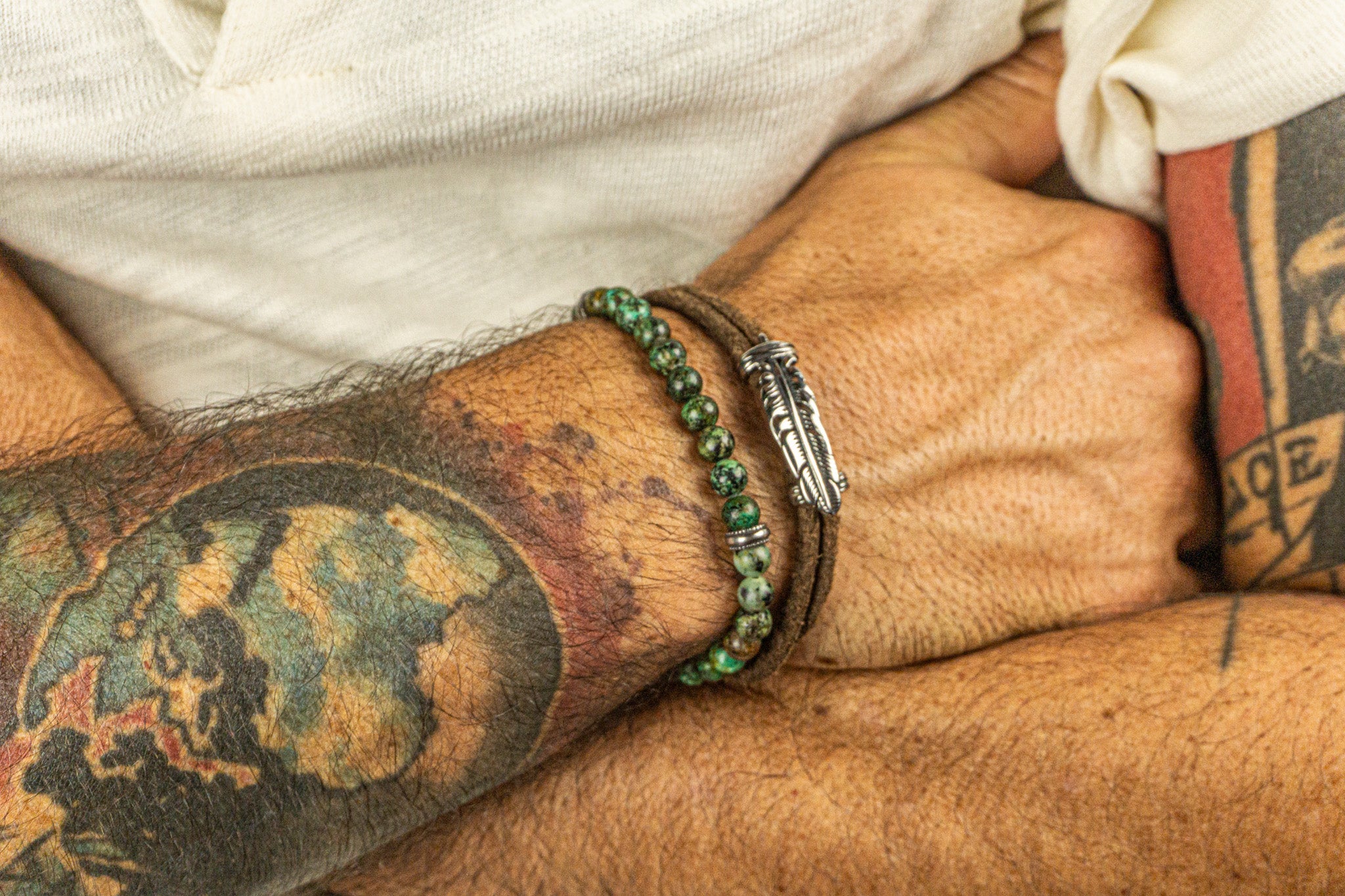 mens leather wrap bracelet with silver feather and green african turquoise bead matching bracelet set - wander jewellery