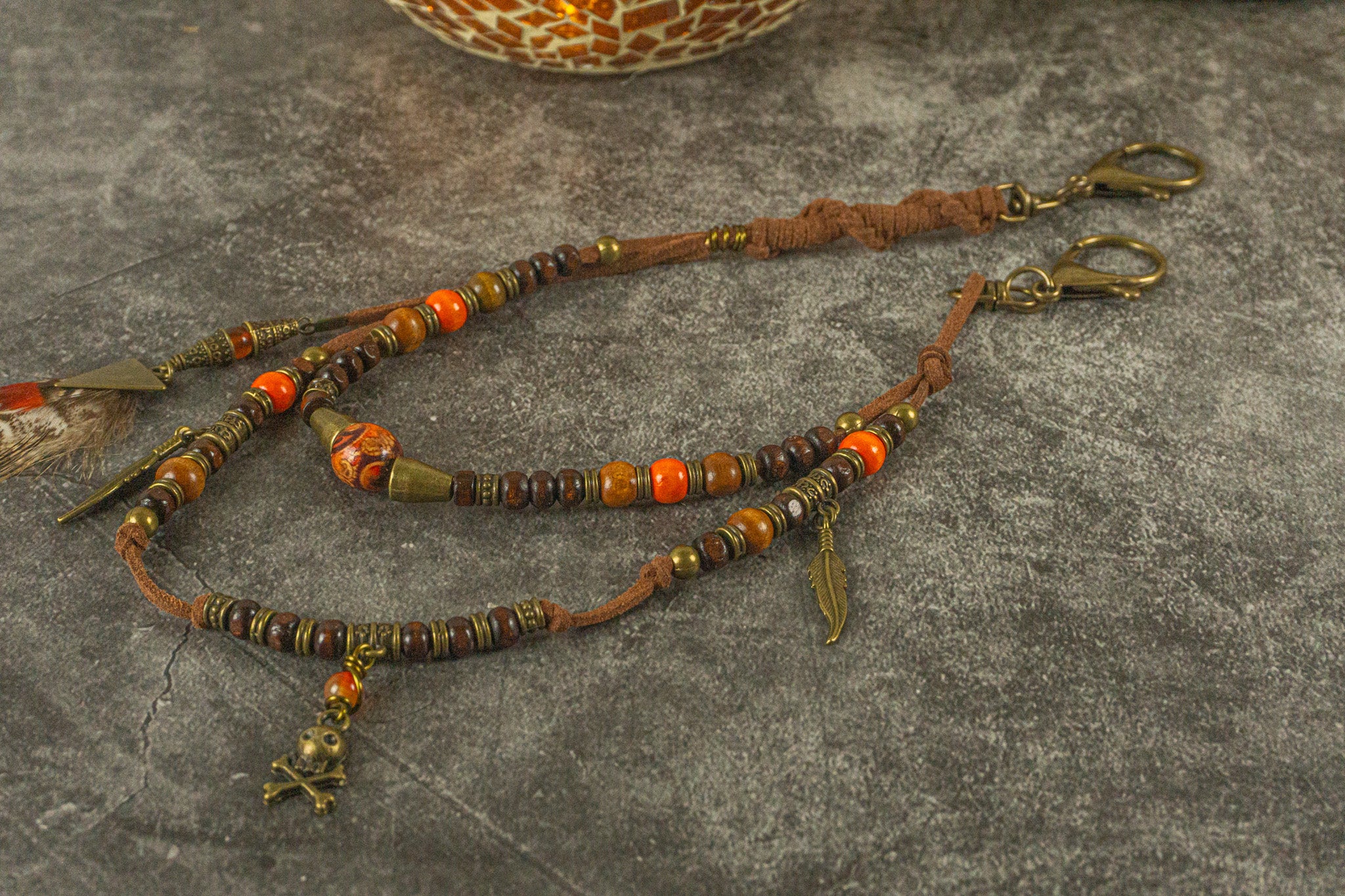 leather and wooden layered keychain with feathers and bronze dangle charms- wander jewellery