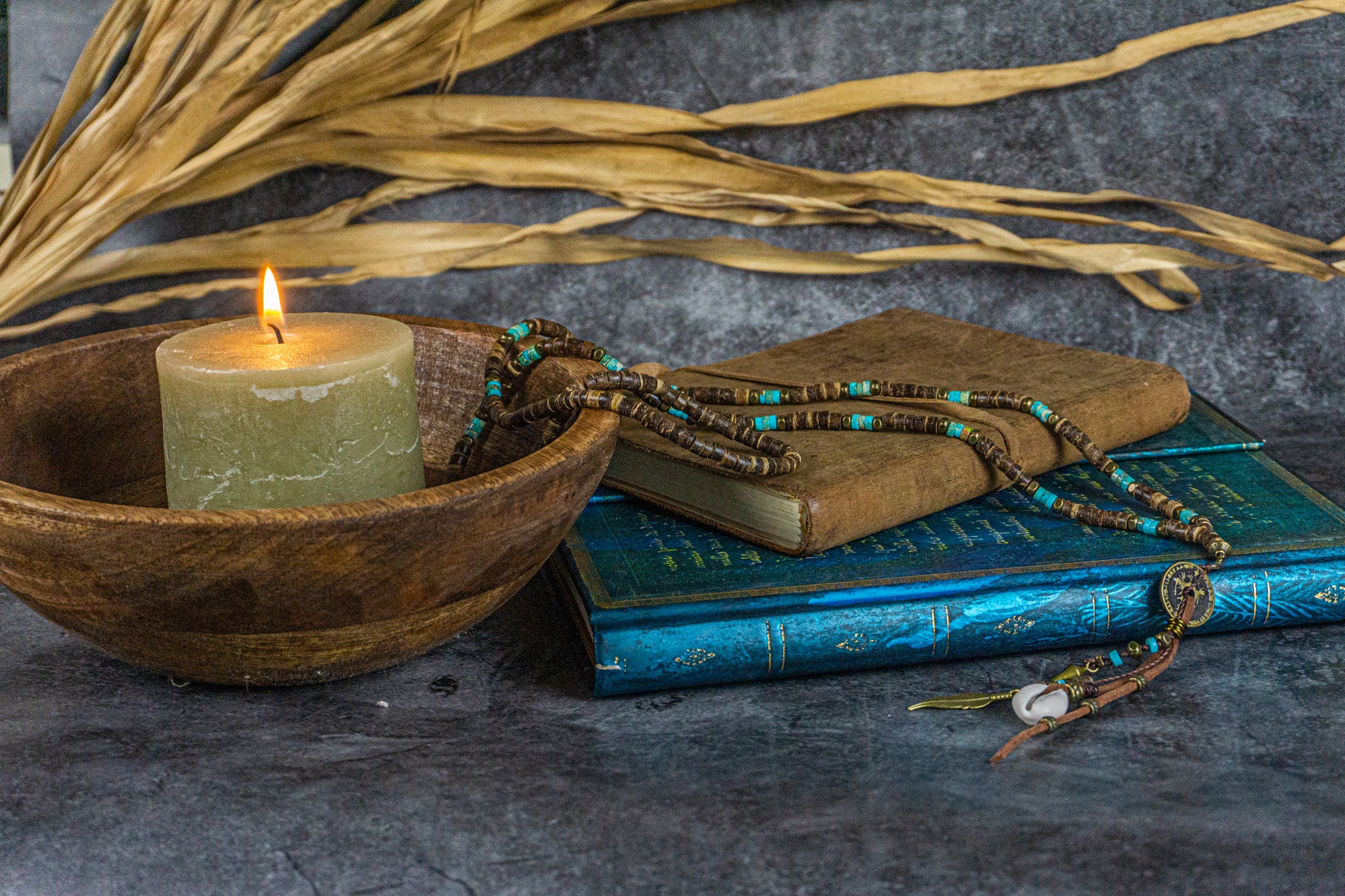 long coconut and turquoise gemstone bead, with a long tribal multi charm pendant- wander jewellery