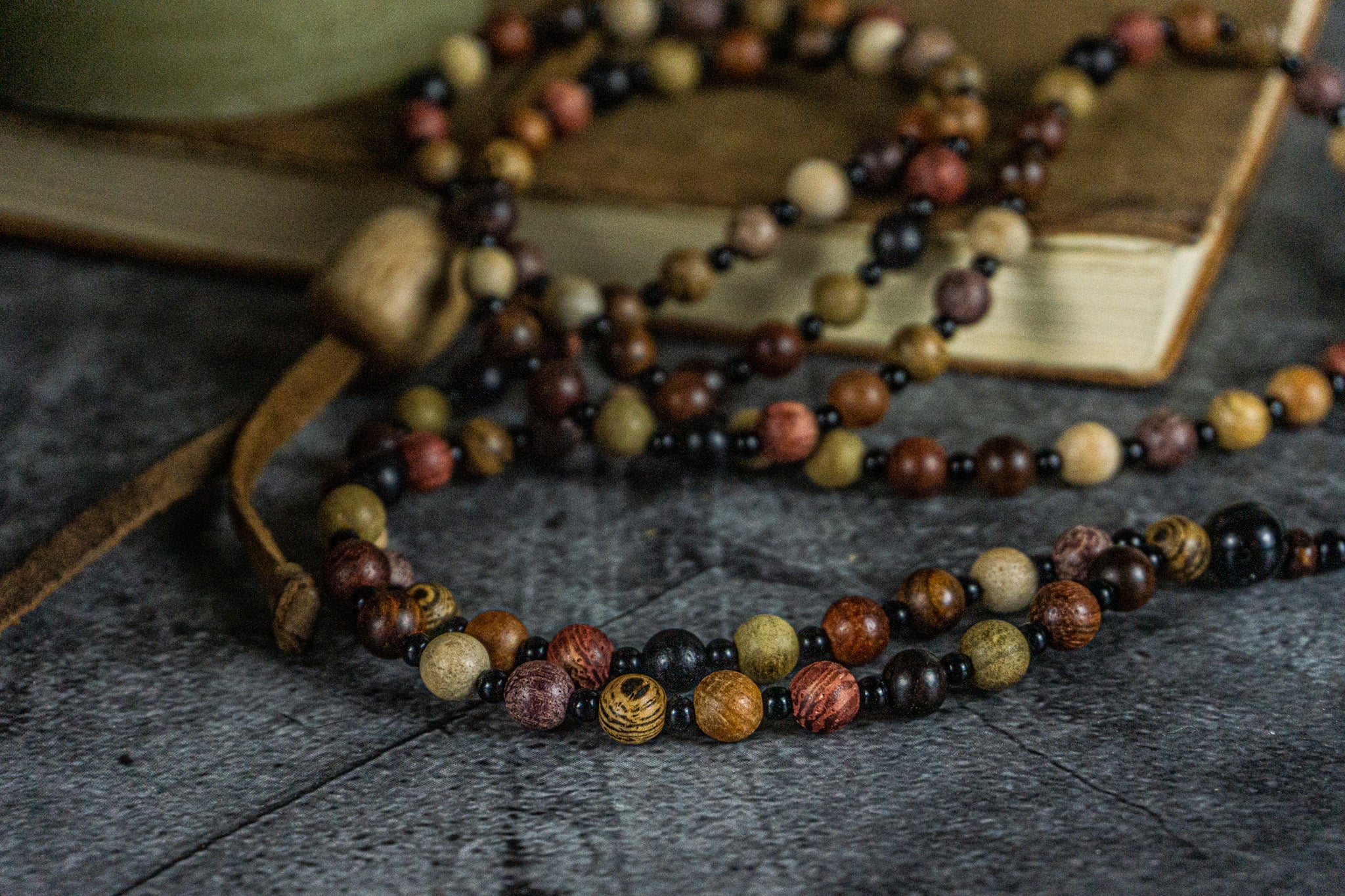 long multi color wooden beaded necklace with black onyx pendant- wander jewellery