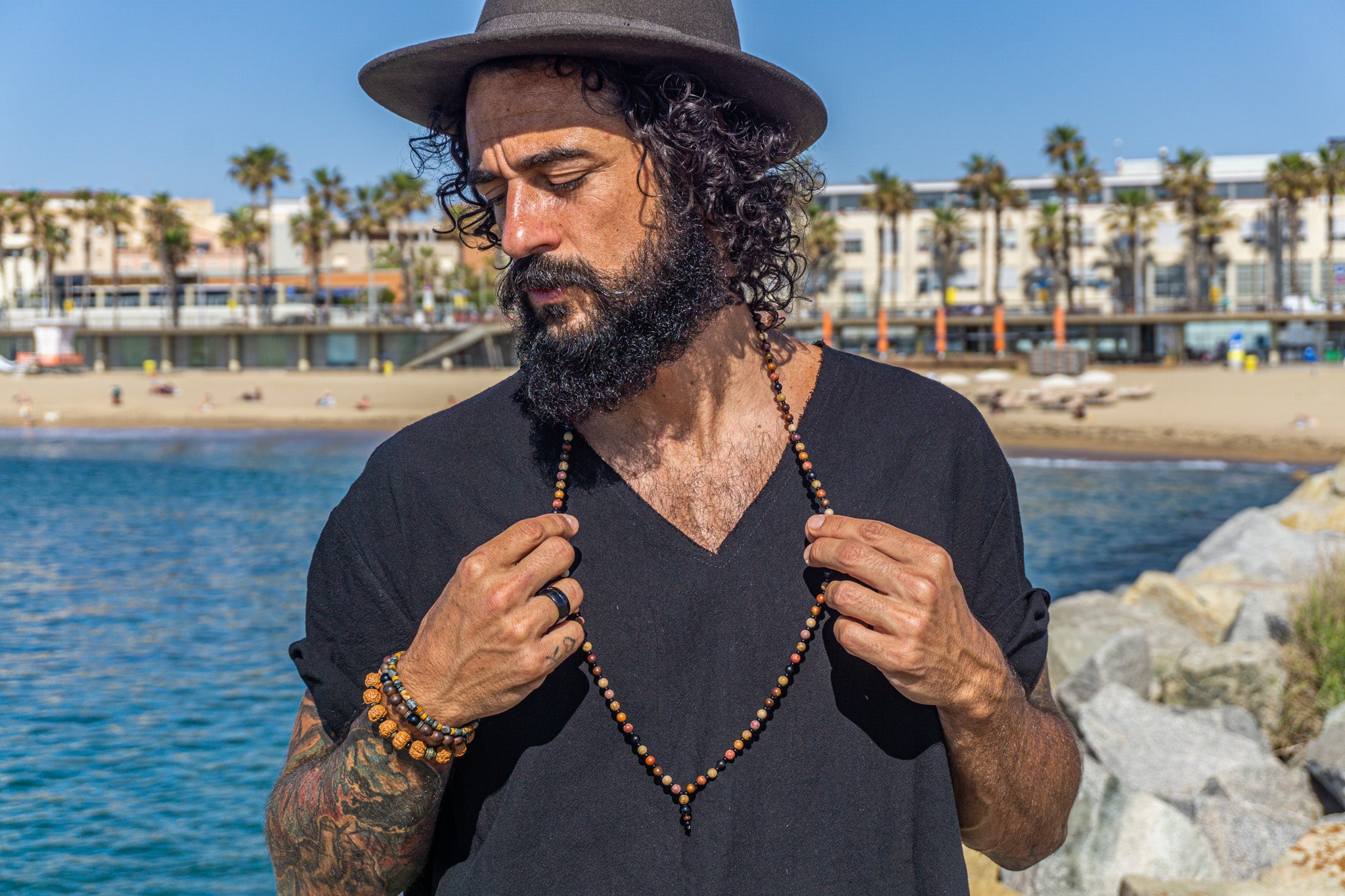 mens extralong colorful wooden beaded necklace with onyx pendant- wander jewellery