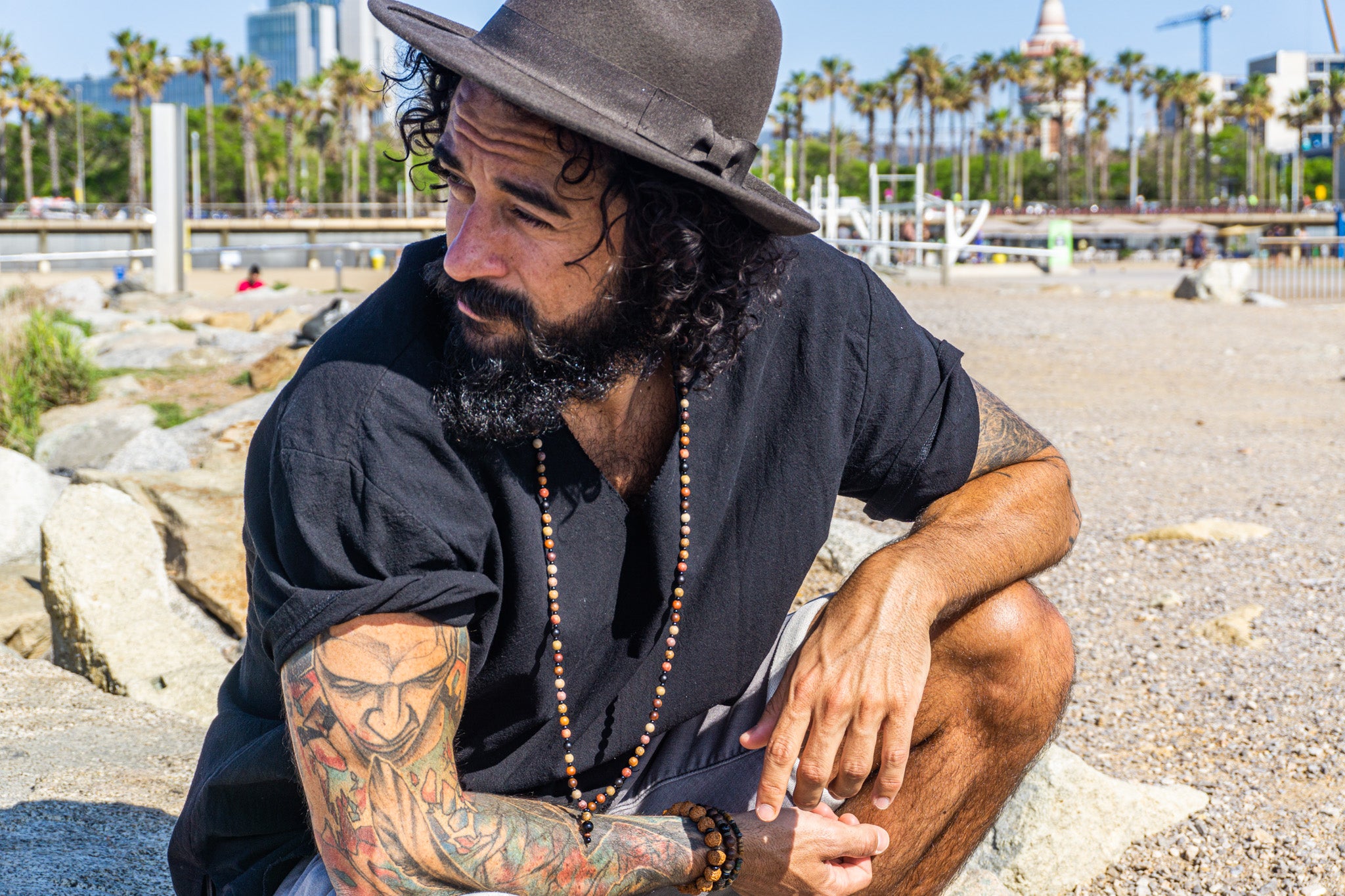 mens extralong colorful wooden beaded necklace with black onyx gemstones- wander jewellery
