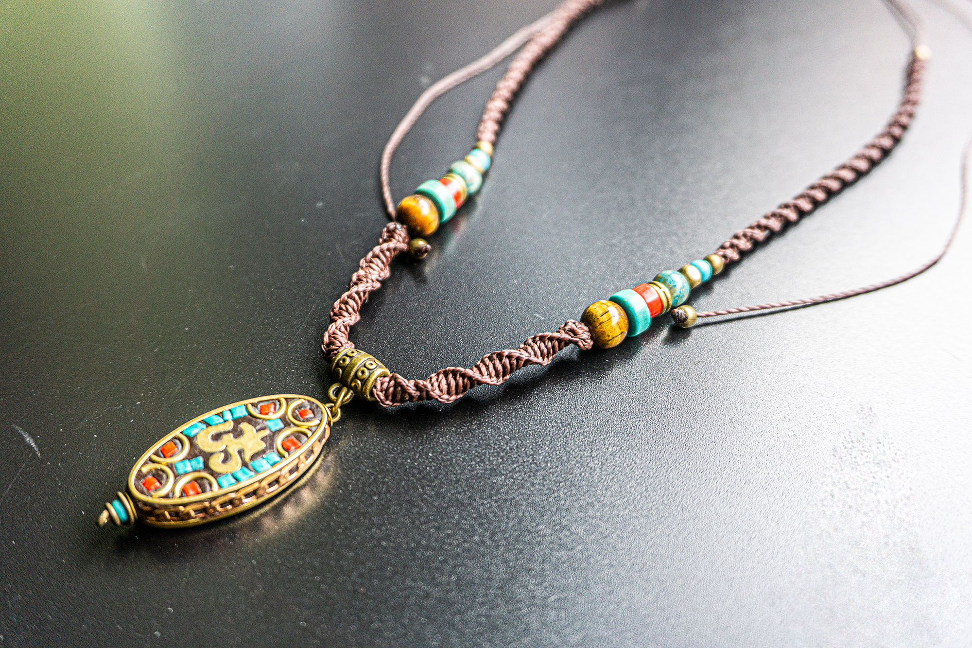 Boho spiritual macrame necklace with Om Tibetan pendant- wander jewellery