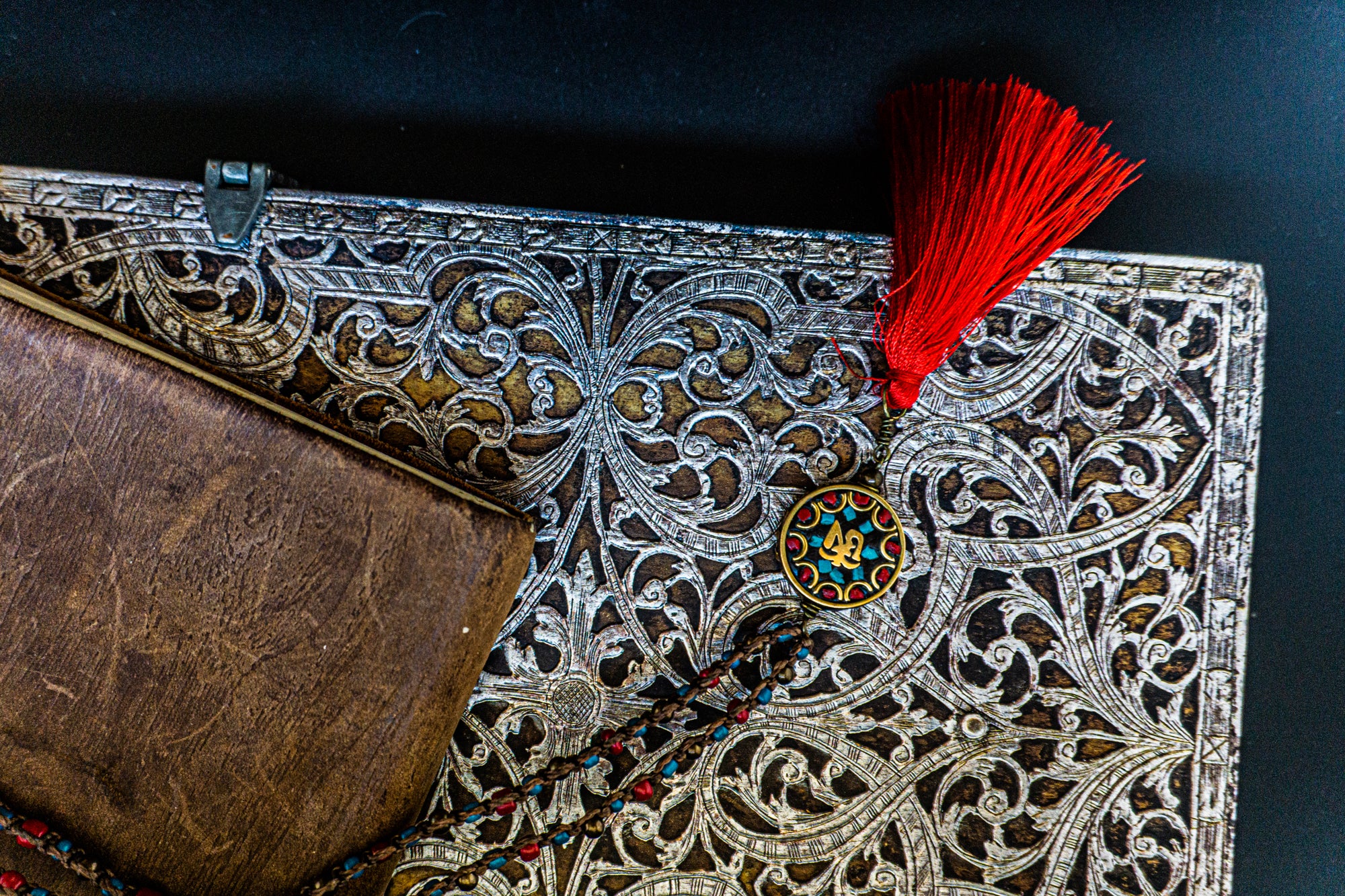 macrame necklace with tibetan pendant and tassel- wander jewellery