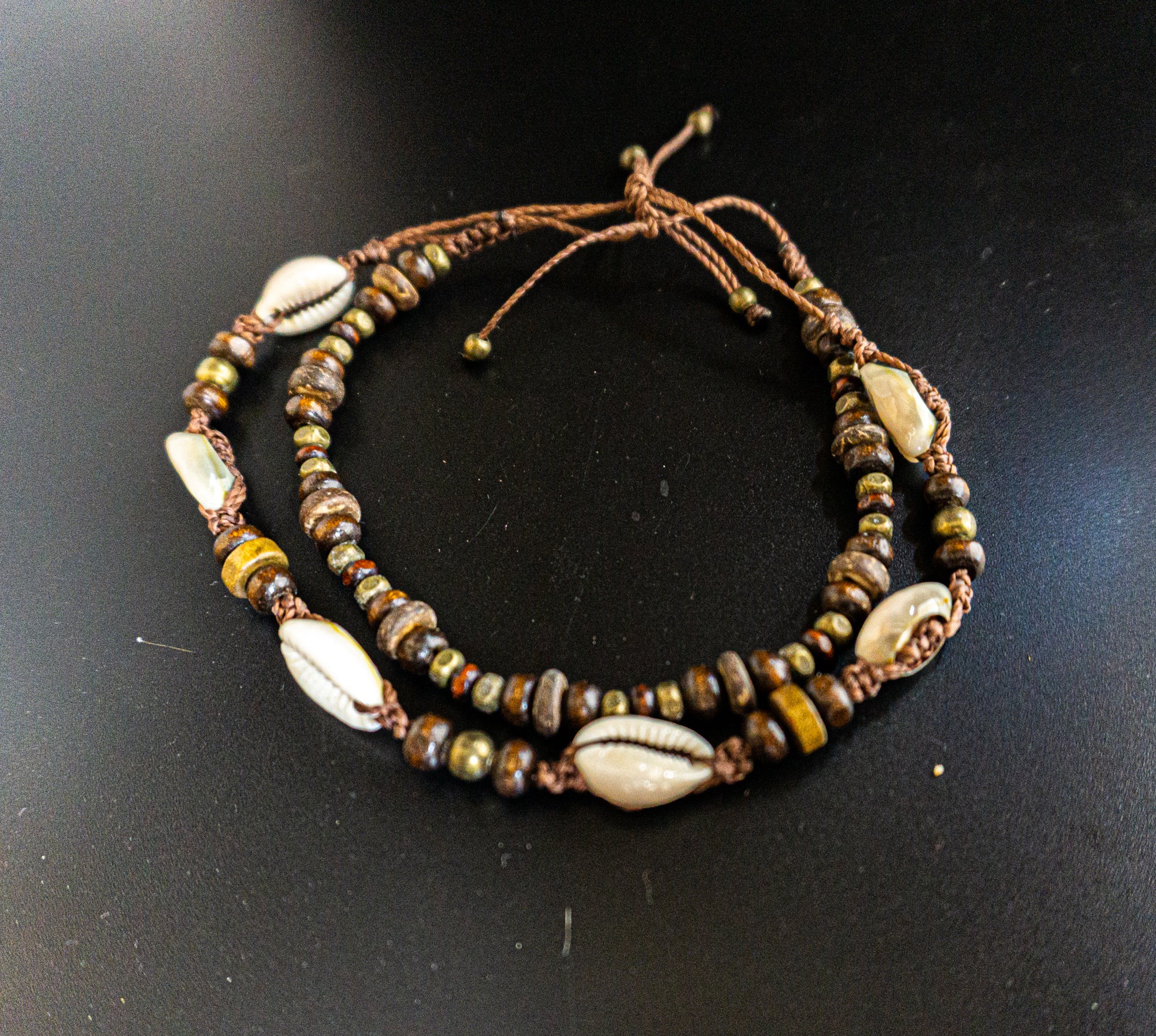 wood and coconut beaded cowrie shell anklet set of 2- wander jewellery