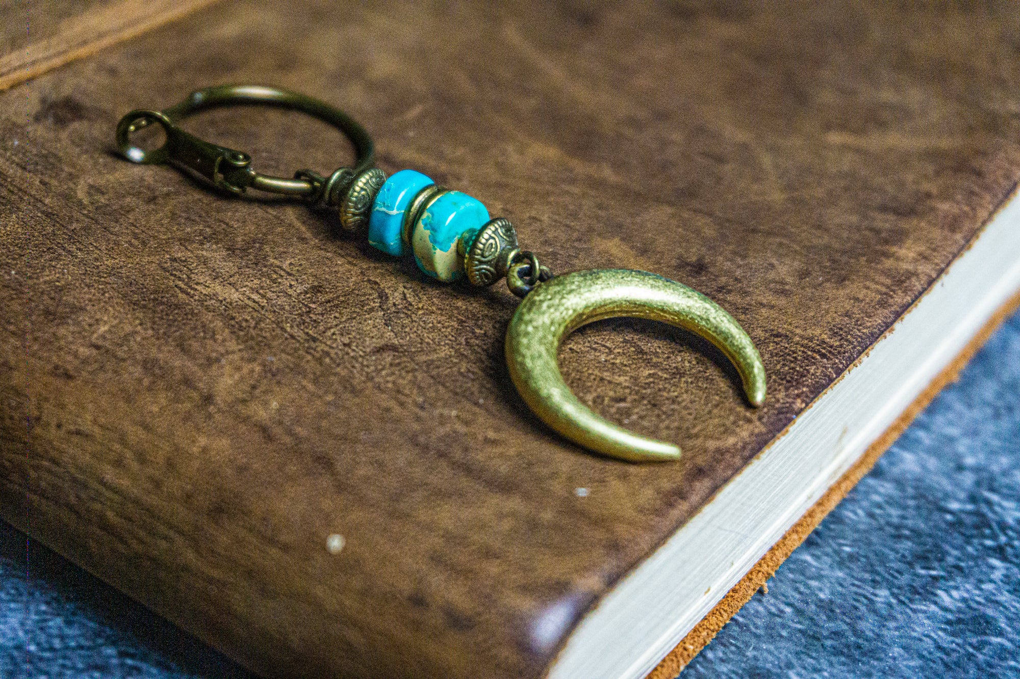 hoop earring wit turquise gemstones and a crescent moon dangle charm- wander jewellery