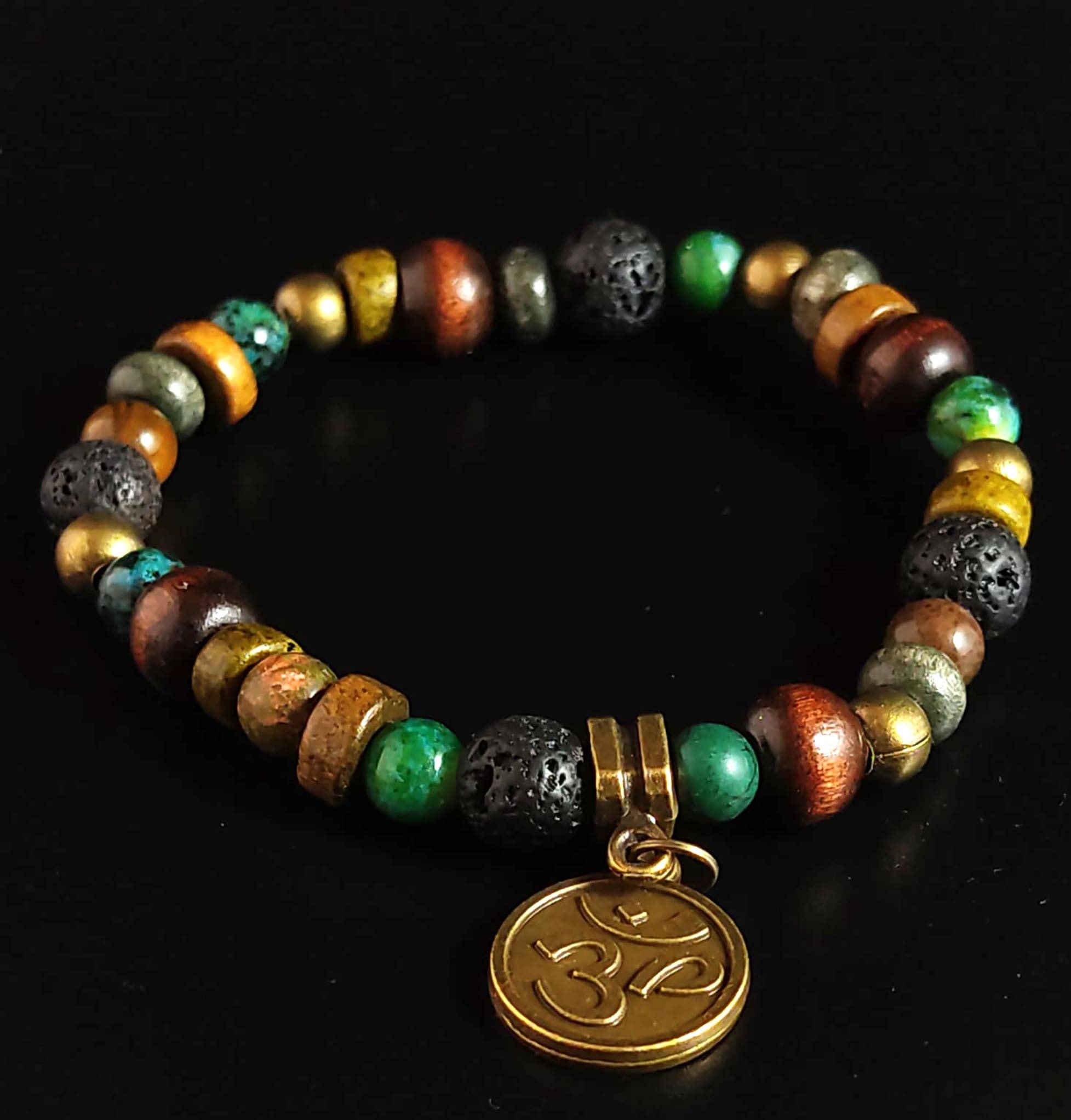 wood, lava and jade beaded bracelet with om chams- wander jewellery