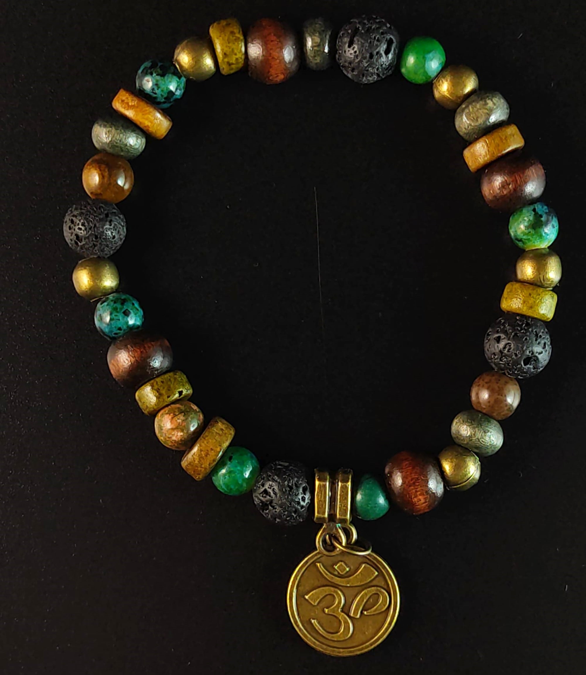 wood, lava stone and green jade beaded bracelet with om chams- wander jewellery