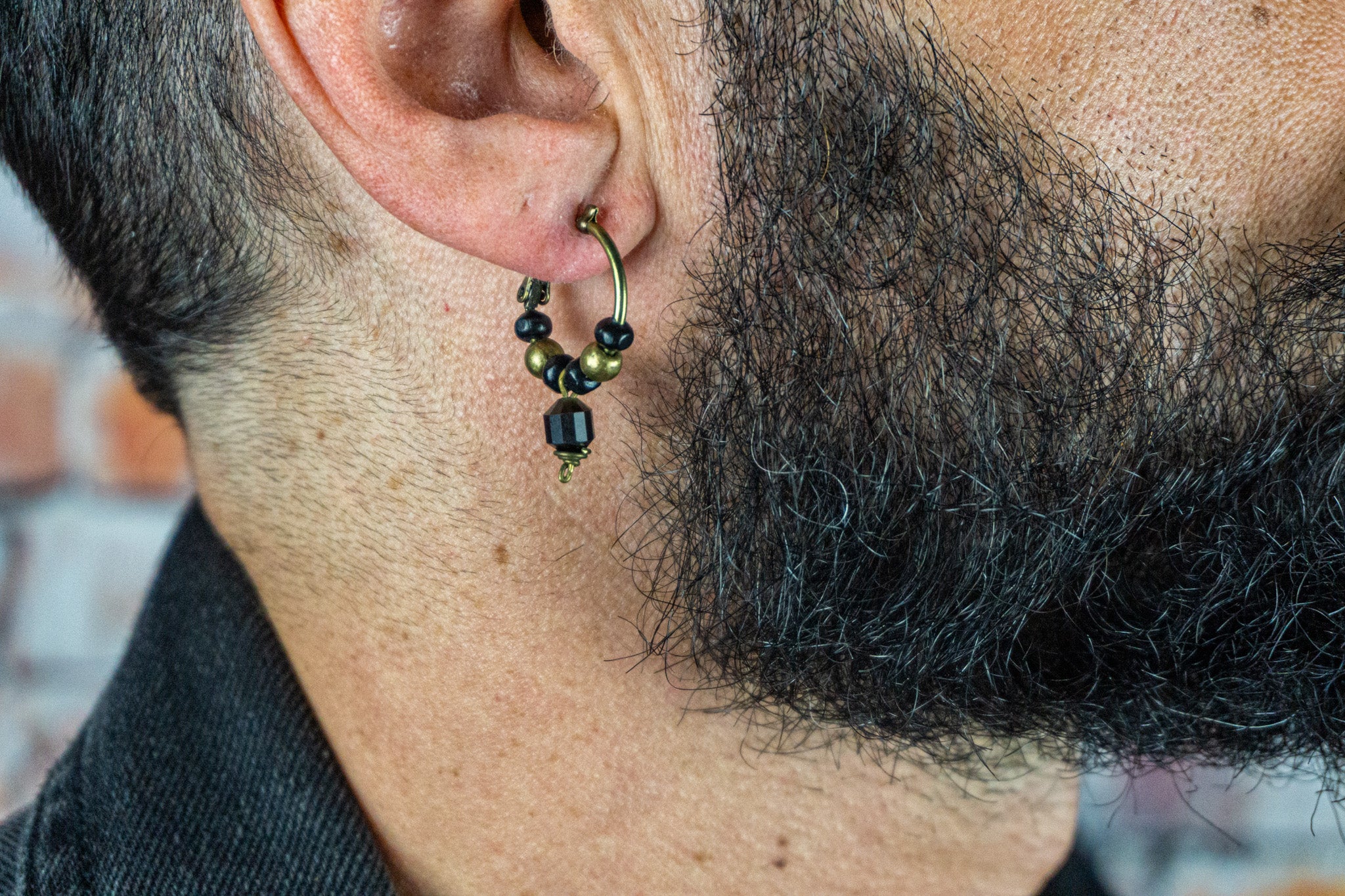 mens bronze hoop earring with black wooden bead and golden obsidian - wander jewellery