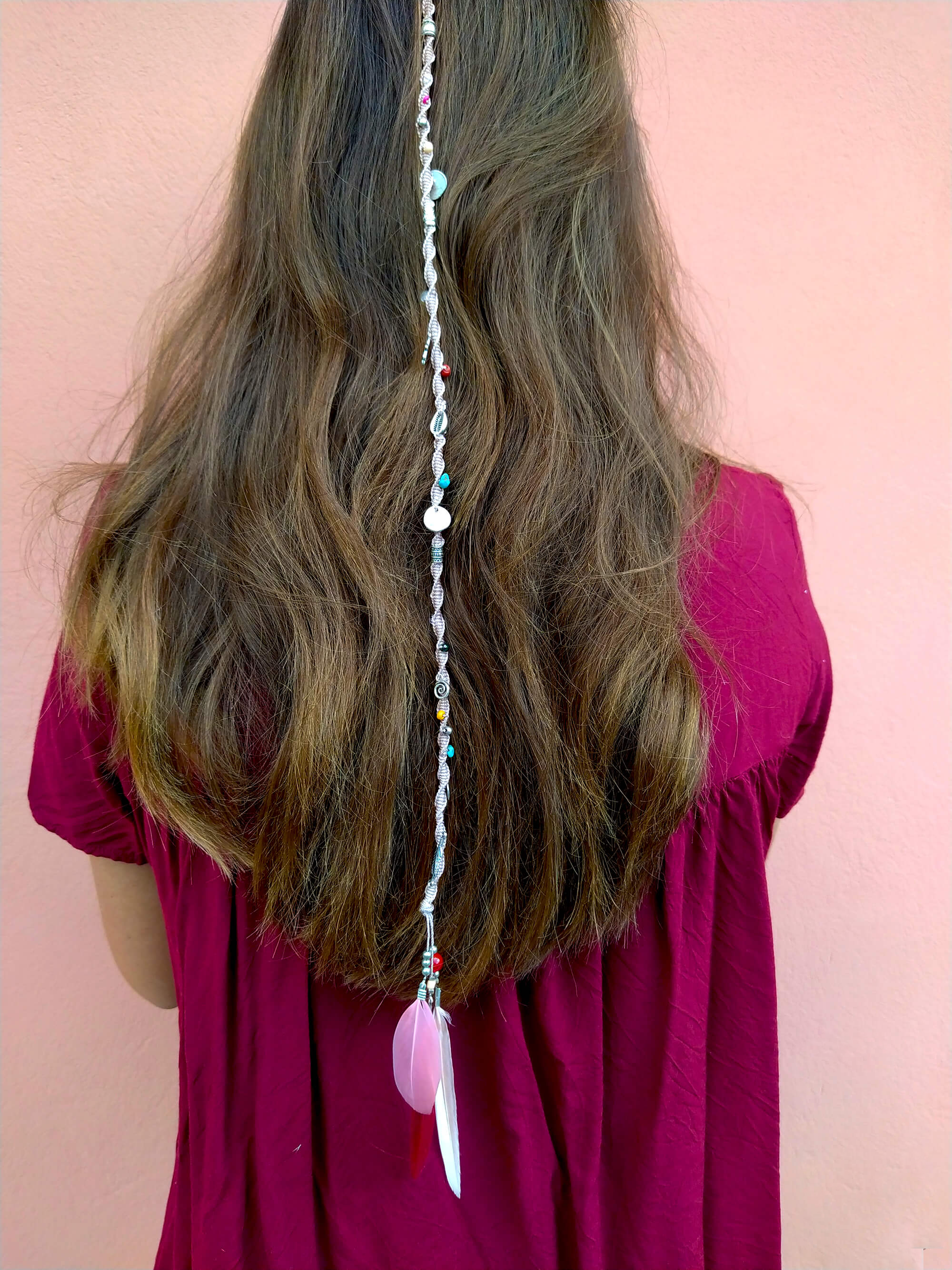 womens pink woven macrame hair wrap with charms and pink feathers- wander jewellery