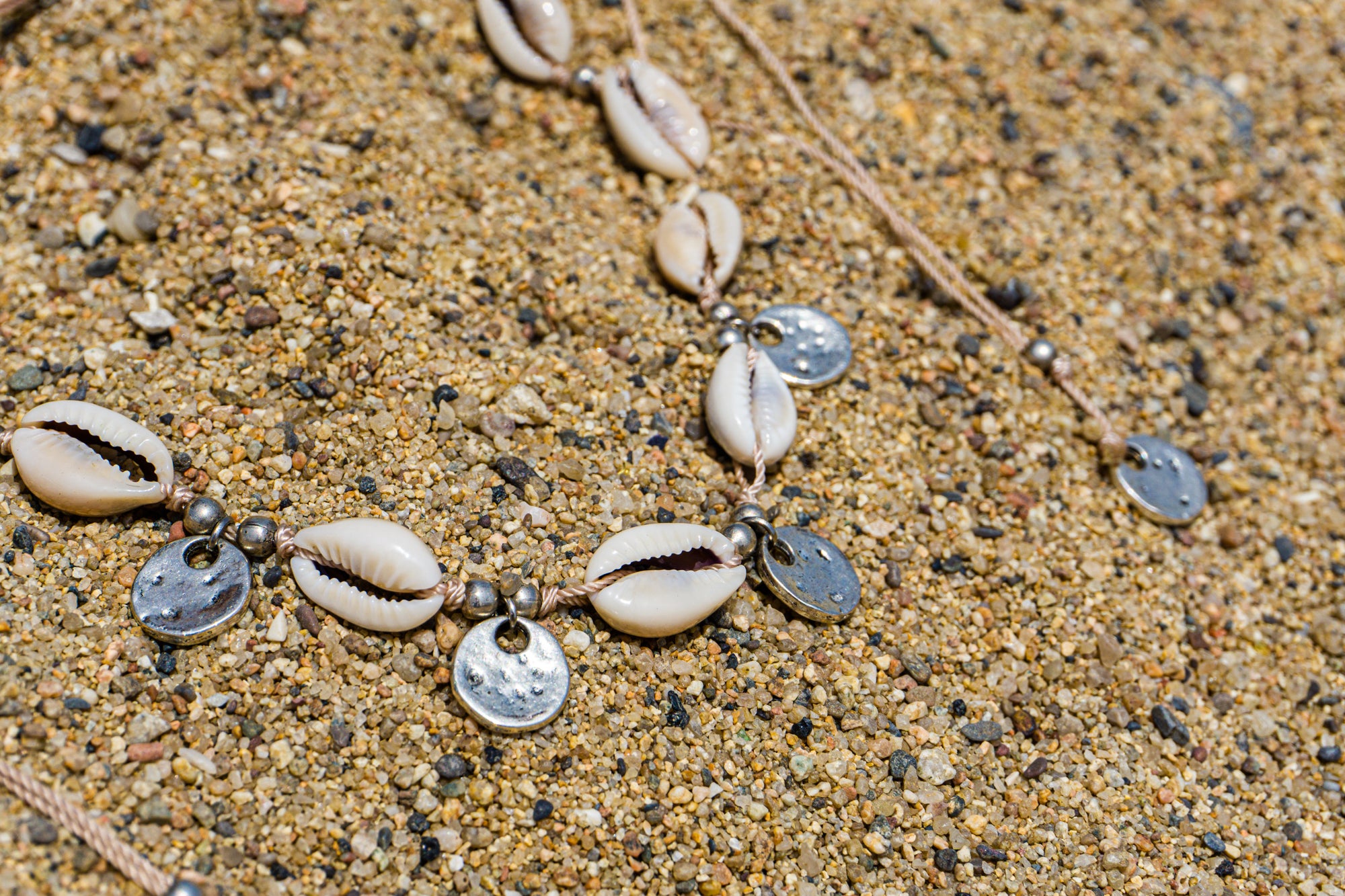 womens boho cowrie shell choker with silver charm- wander jewellery