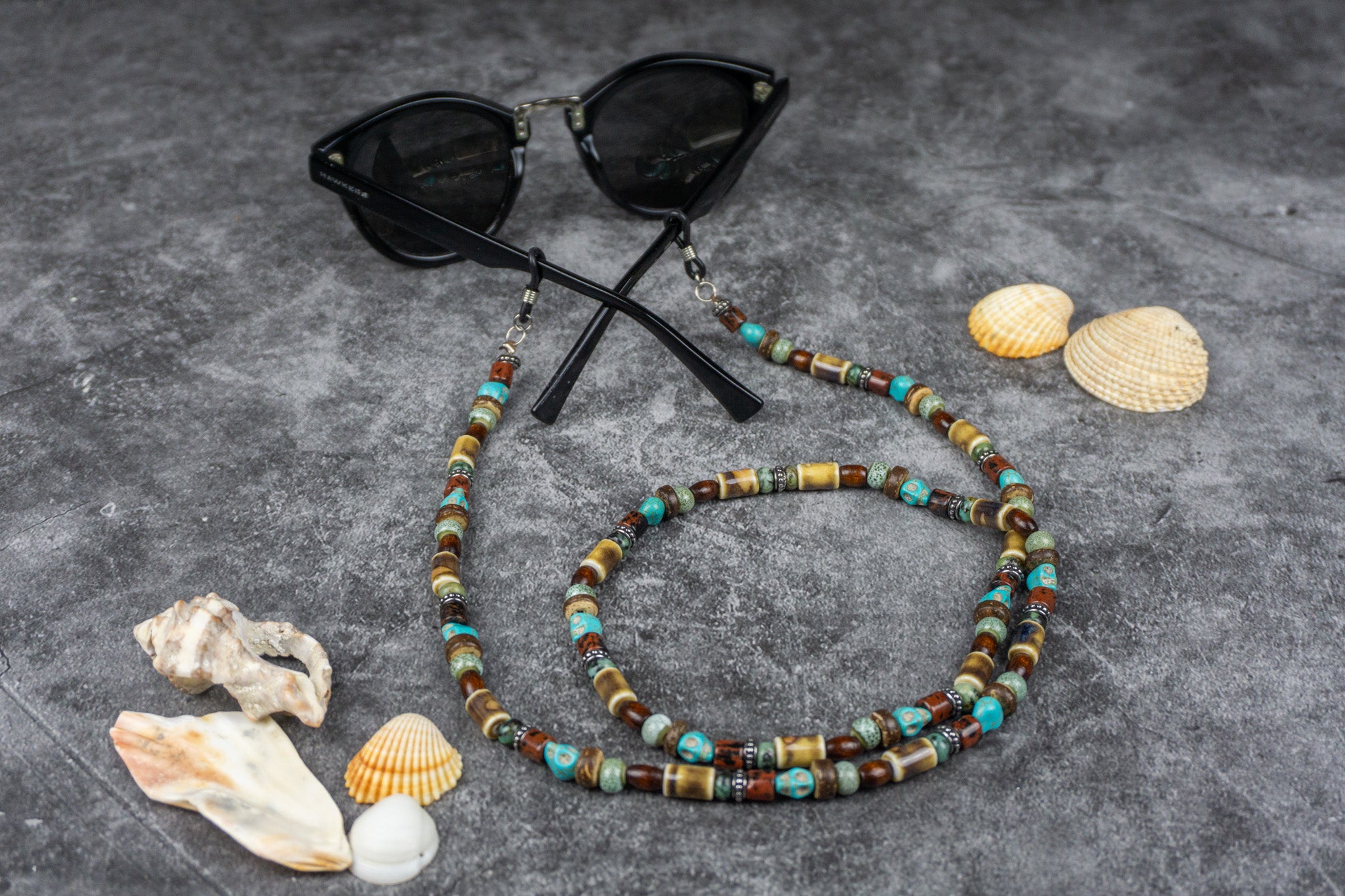 Multi-color glasses chain holder with skull beads, porcelain, coconut beads, and wood for a bold statement – Wander Jewellery