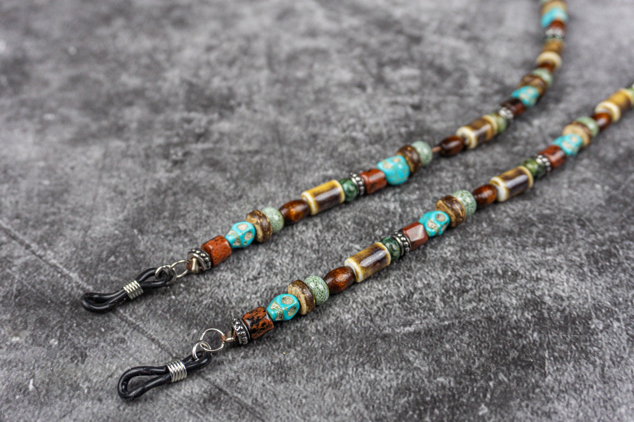 Skull beads sunglasses chain made with ceramic, coconut beads, wood, and jasper gemstones – Wander Jewellery