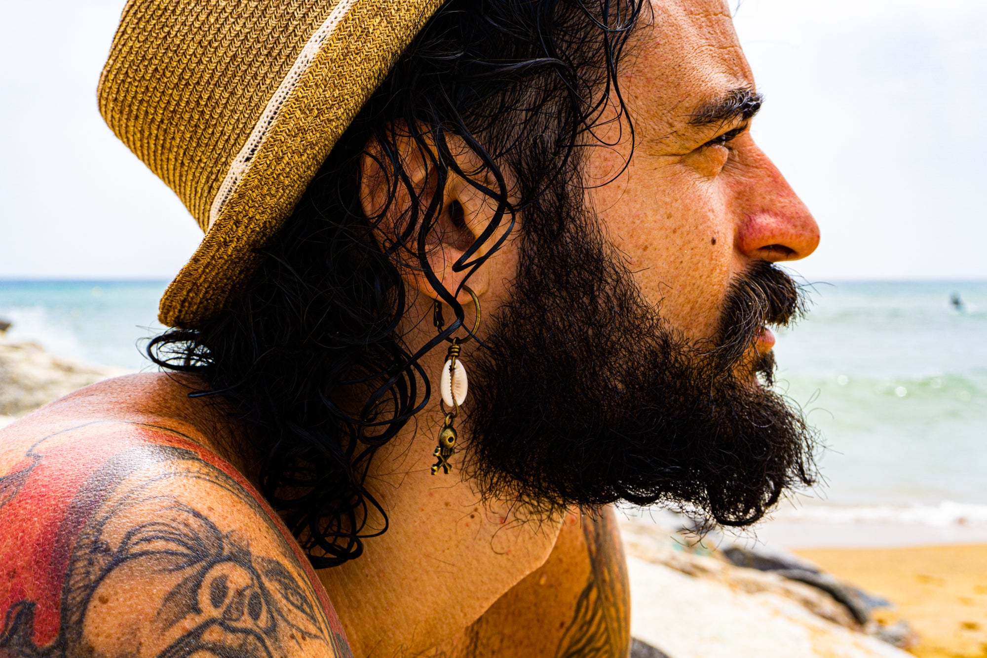 mens hoop earring with shell and skull dangle- wander jewellery