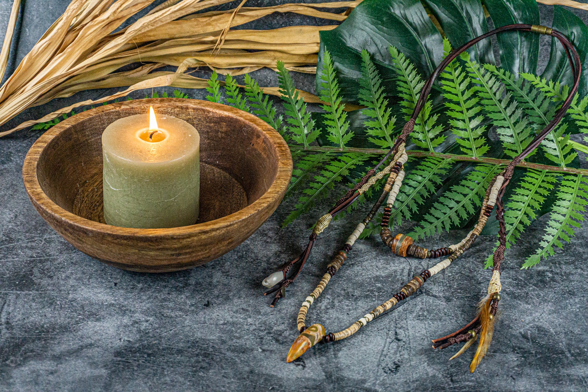 leather coconut and wood long layered pendant necklace set with dangling charms and feather- wander jewellery