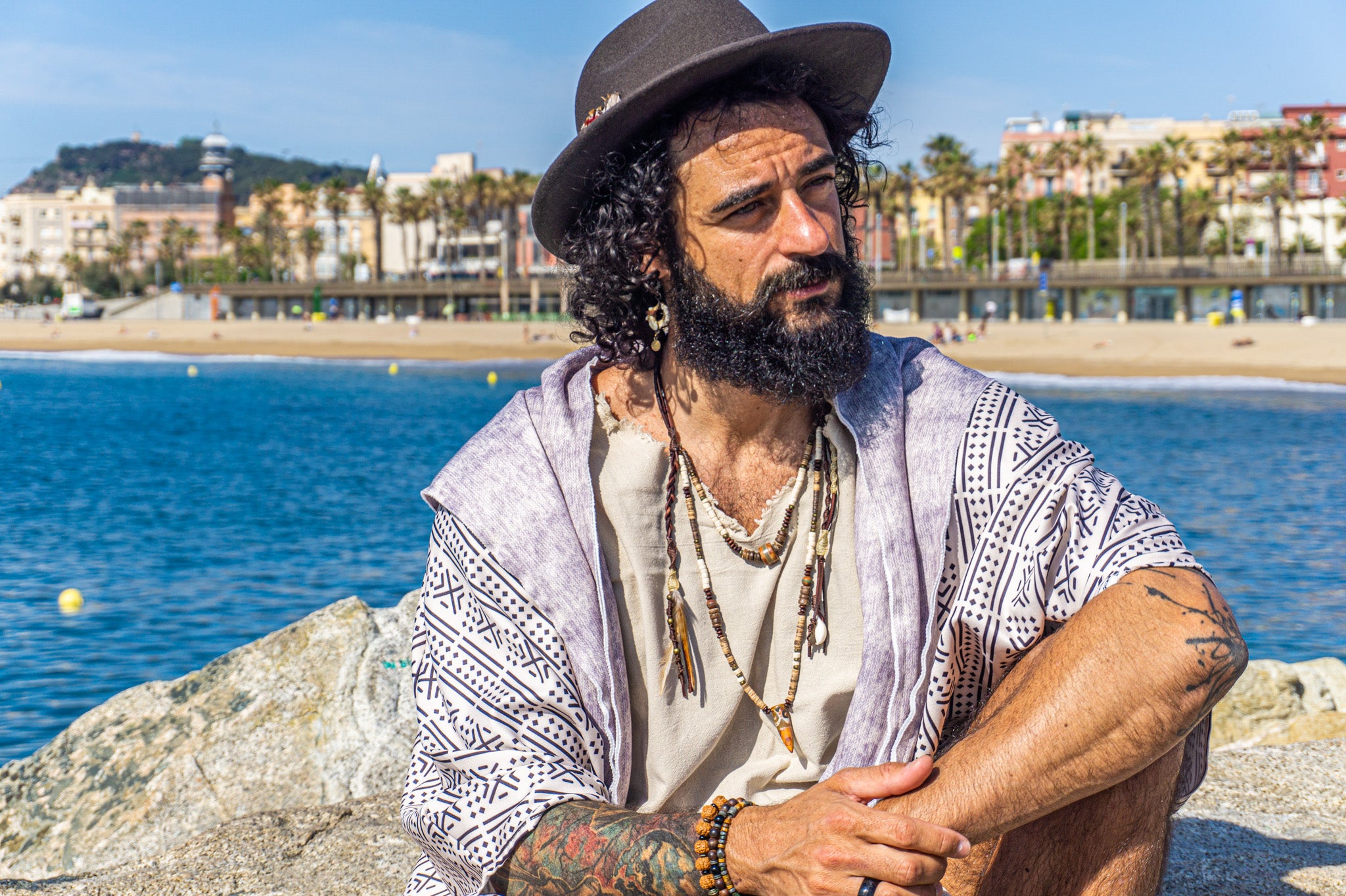 mens leather coconut and wood layered pendant necklace set with dangling charms and feather- wander jewellery