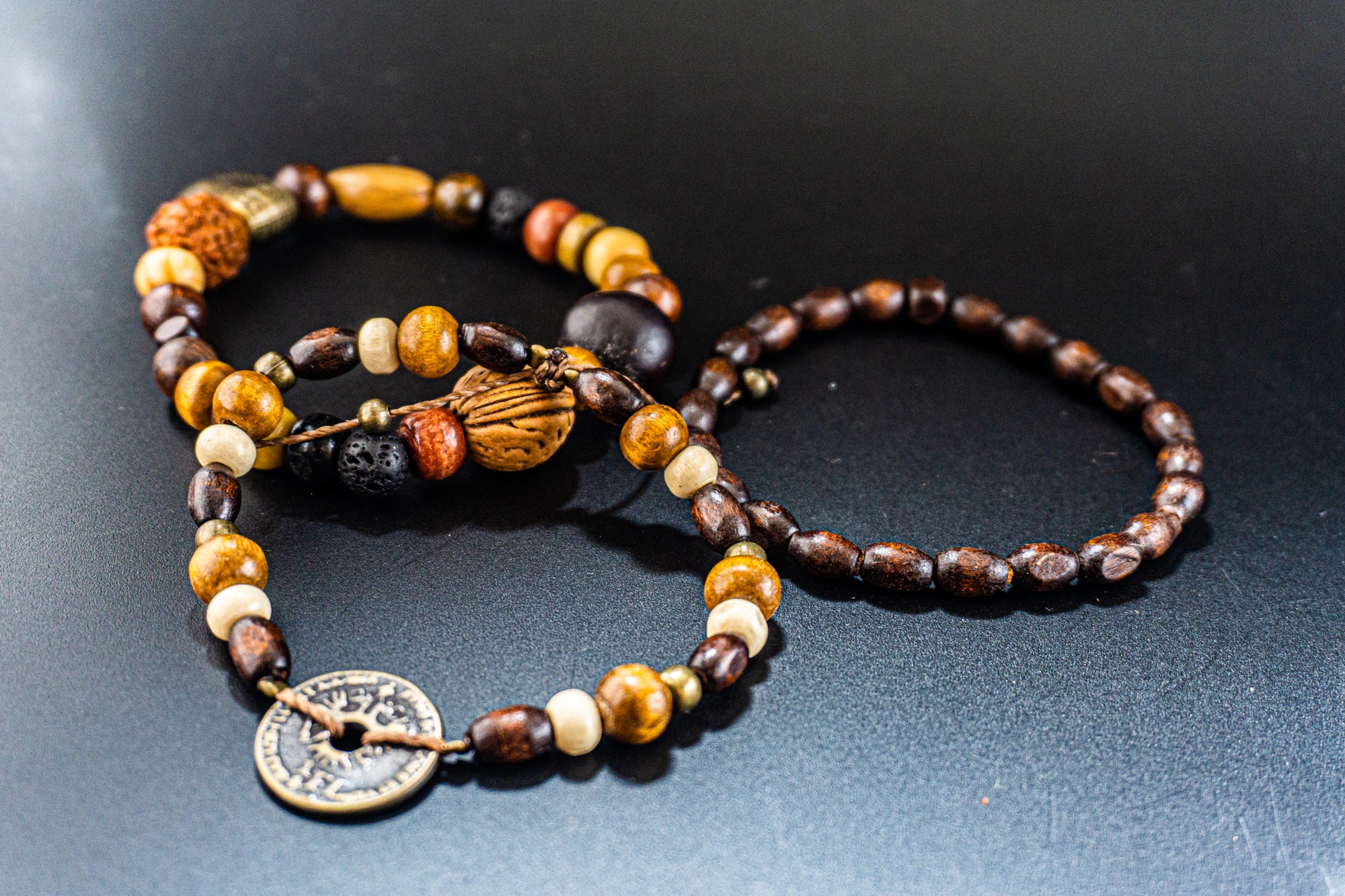 triple wooden beaded bracelet set with charm coin- wander jewellery