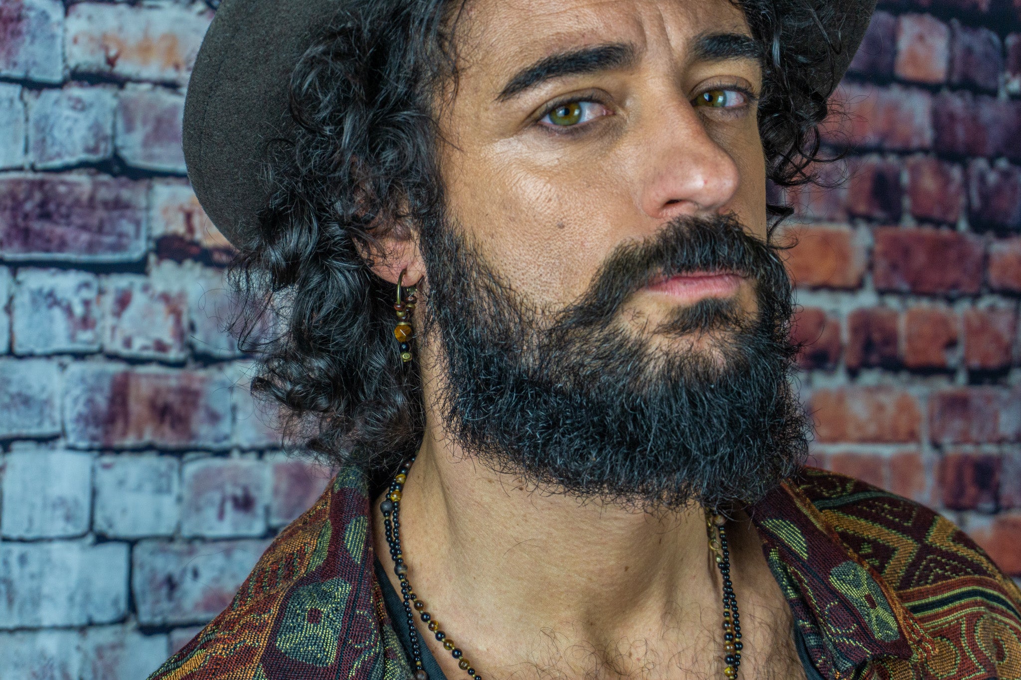 Edgy boho earring for men with gemstones, and beads