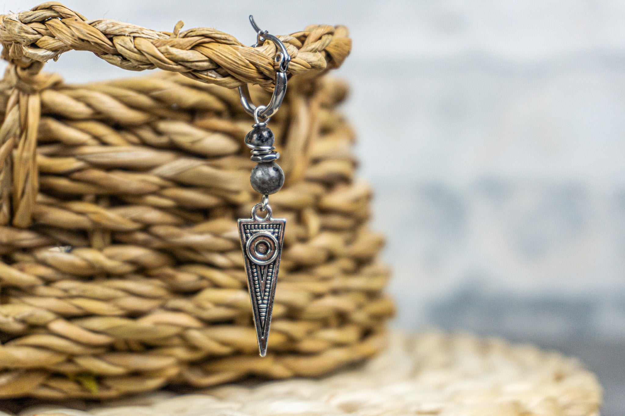 stainless steel hoop triangle earring with a pair of labradorite gemstone beads