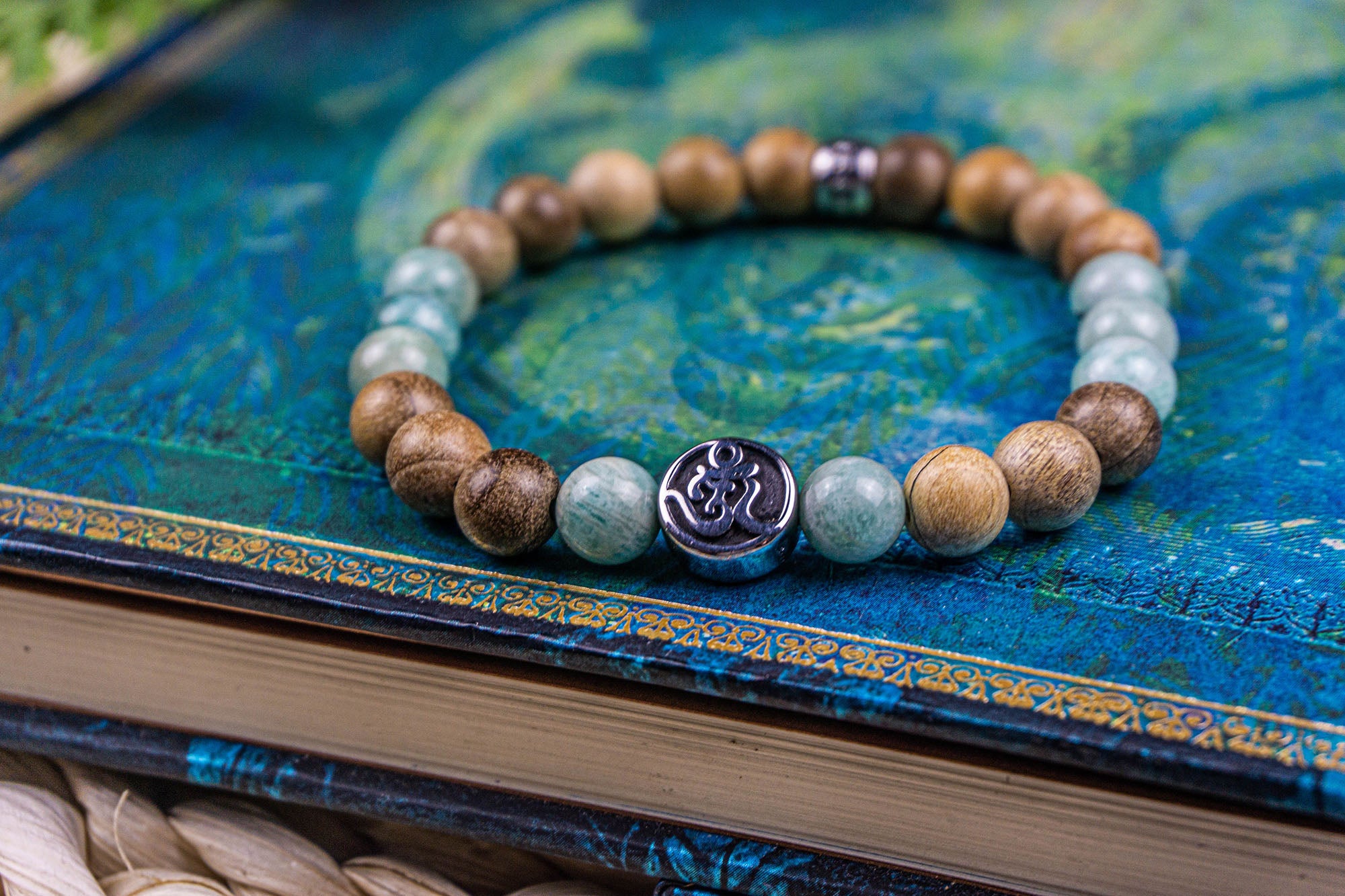 camphor wood amazonite om beaded bracelet
