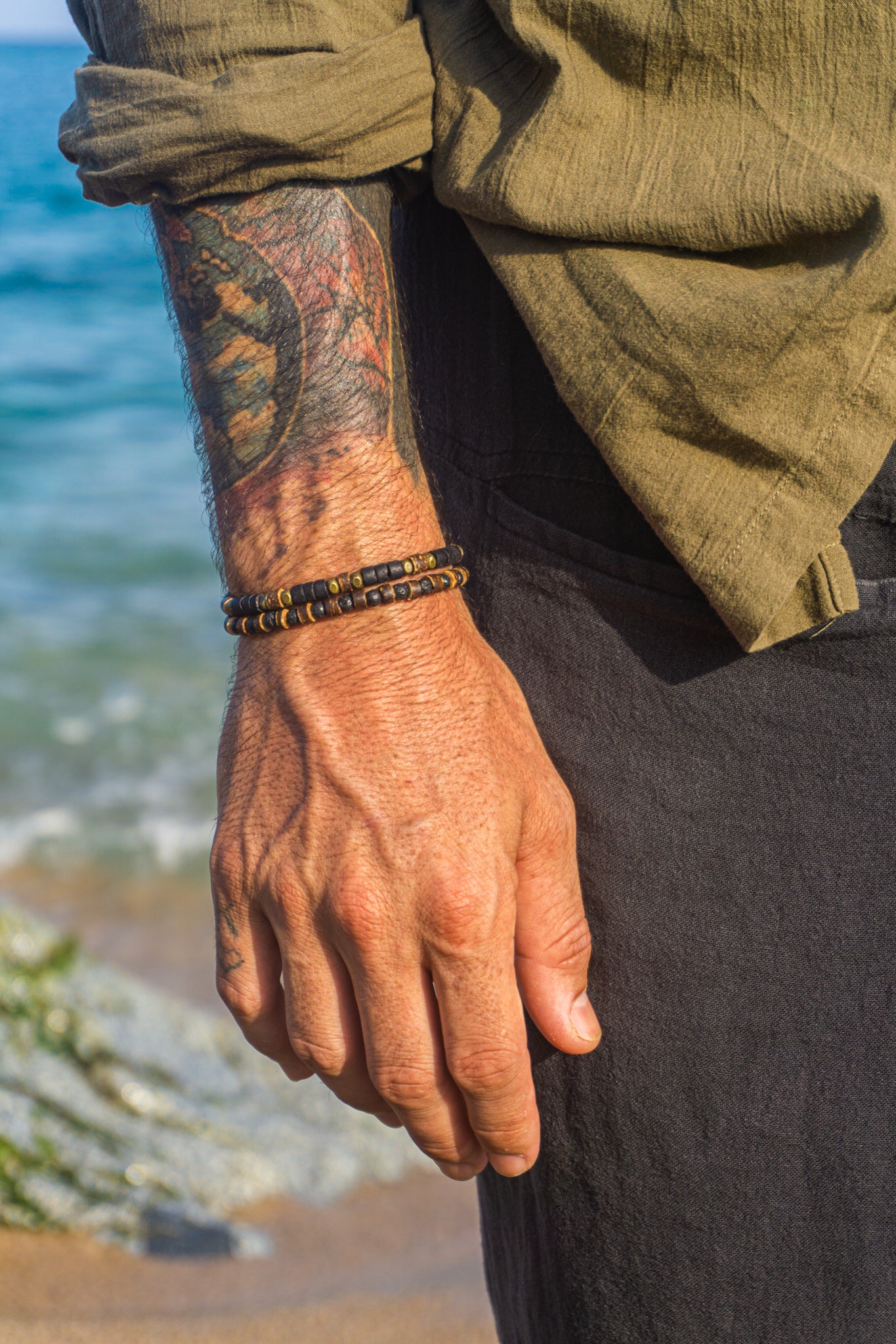 mens double bracelet set made of one black and brown coconut shells bracelet and a lava stone and coconut bracelet- wander jewellery