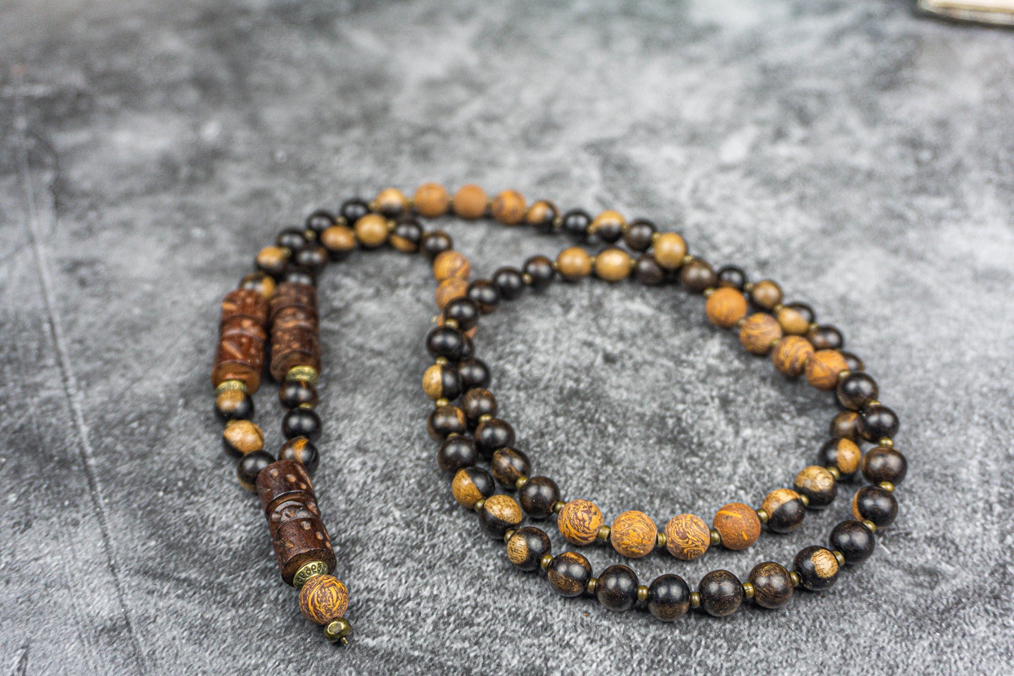 dark ebony wood and elephant skin beaded necklace with carved ebony wood pieces