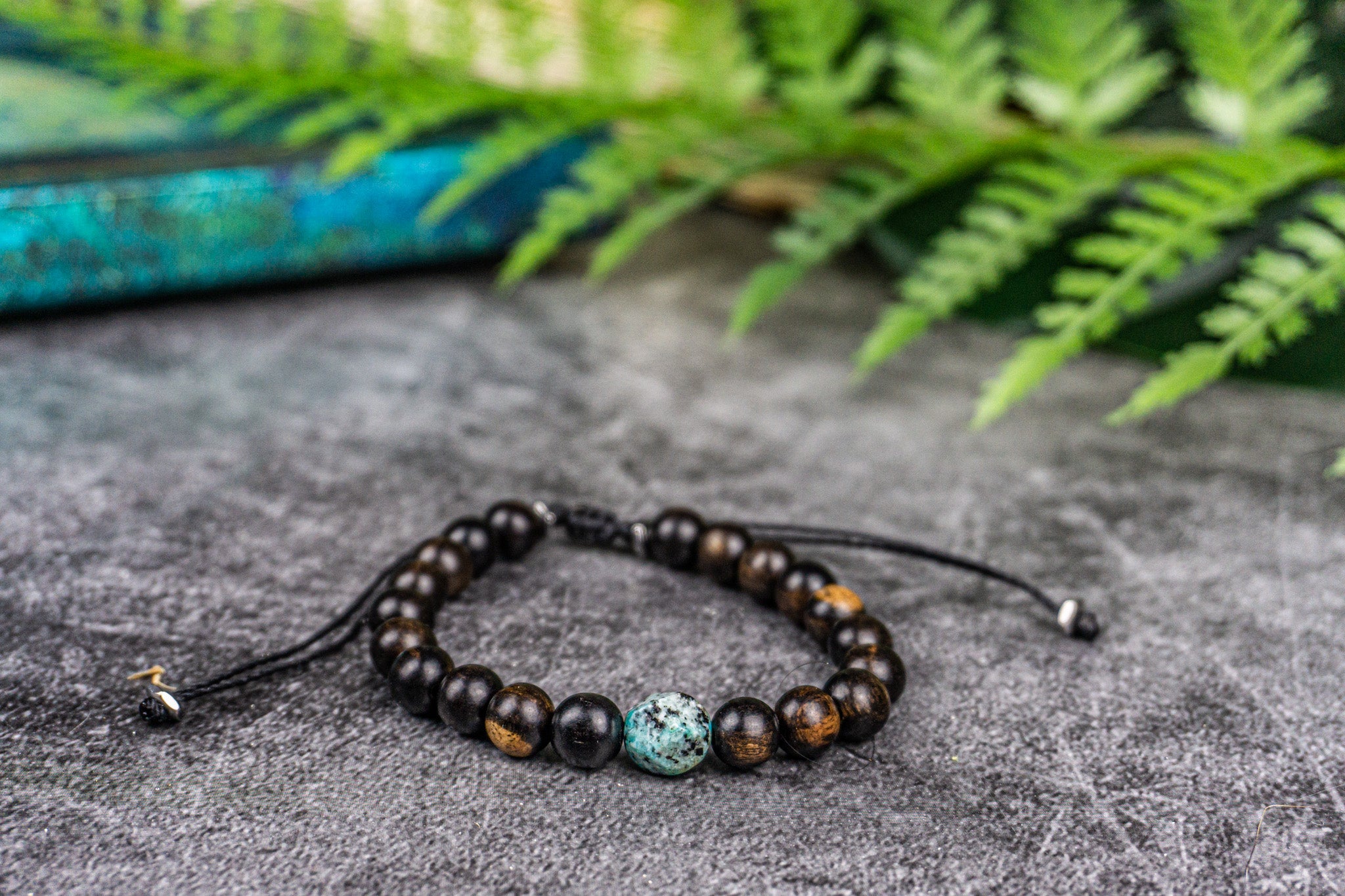 mens ebony wood beaded bracelet with cental kiwi jasper gemstone bead