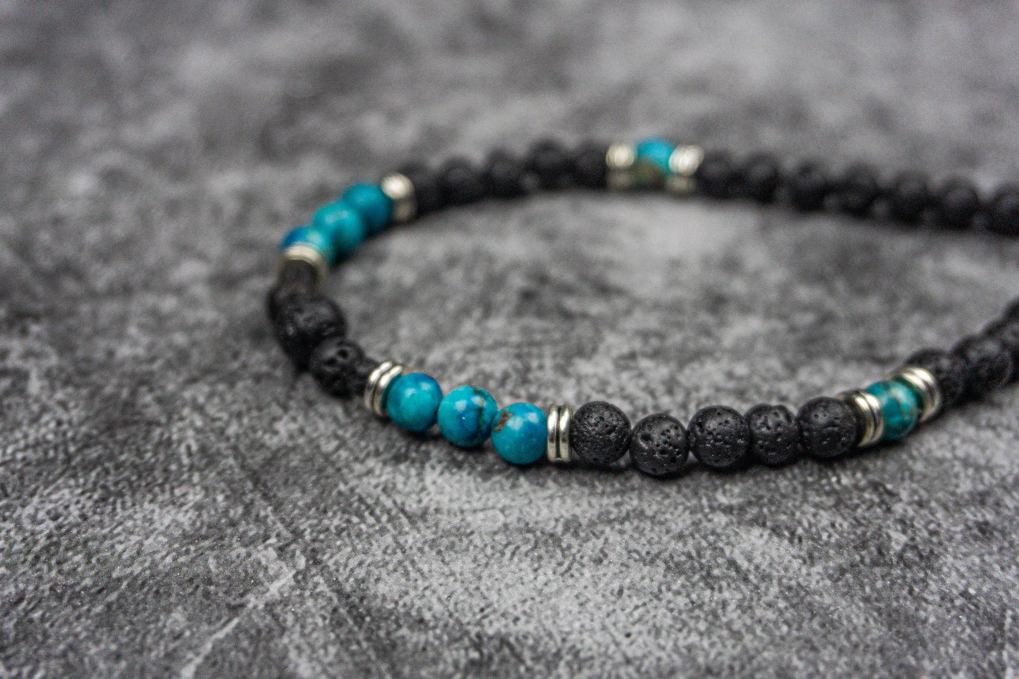 lava stone and turquoise ocean jasper gemstone beaded necklace with silver spacer - wander jewellery