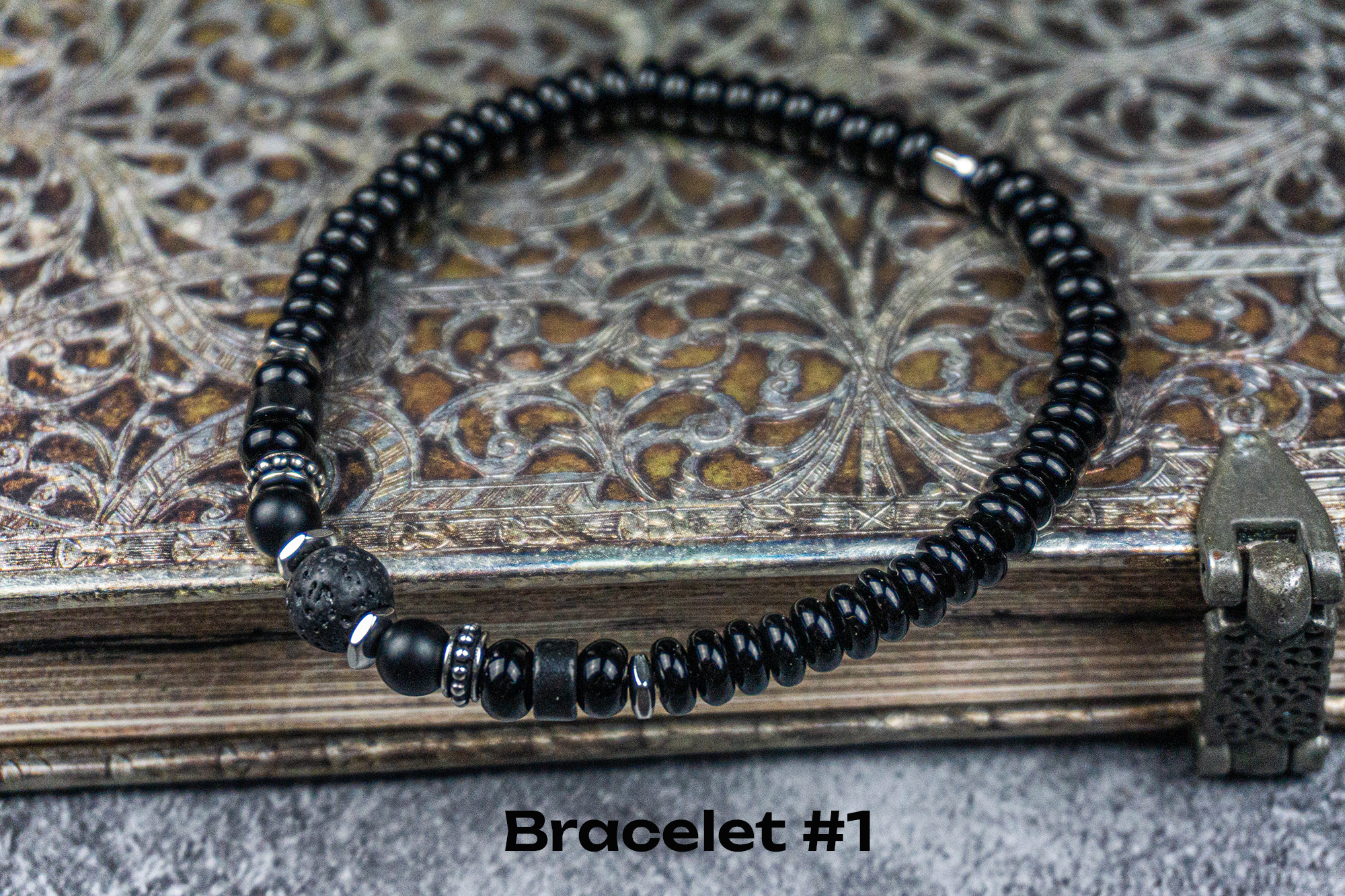 all black onyx and lava stone and stainless steel beaded bracelet