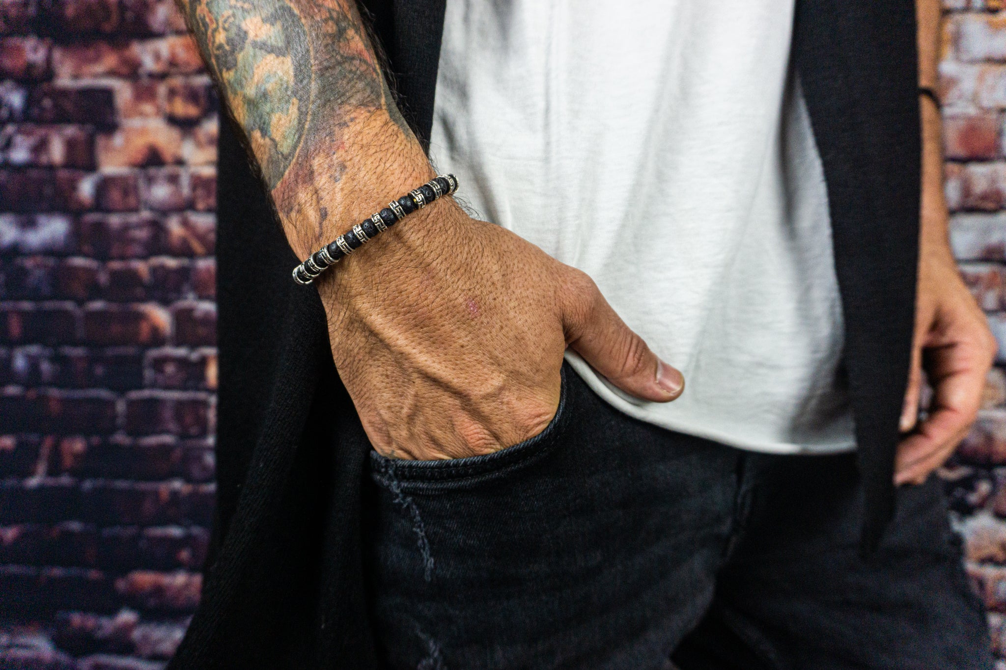 black lava stonebracelet with metal silver color spacer beads