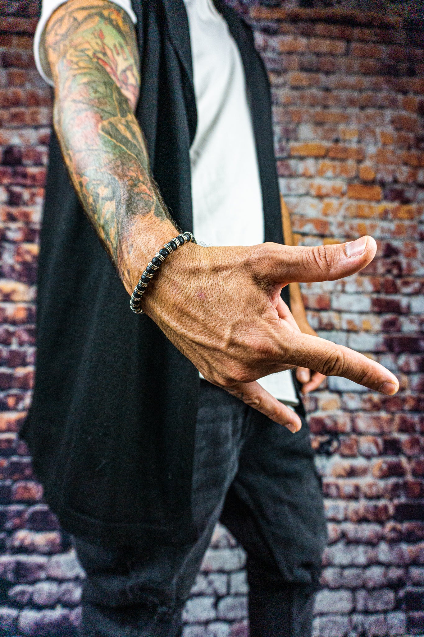 black lava stone 6mm bead bracelet with metal silver color details