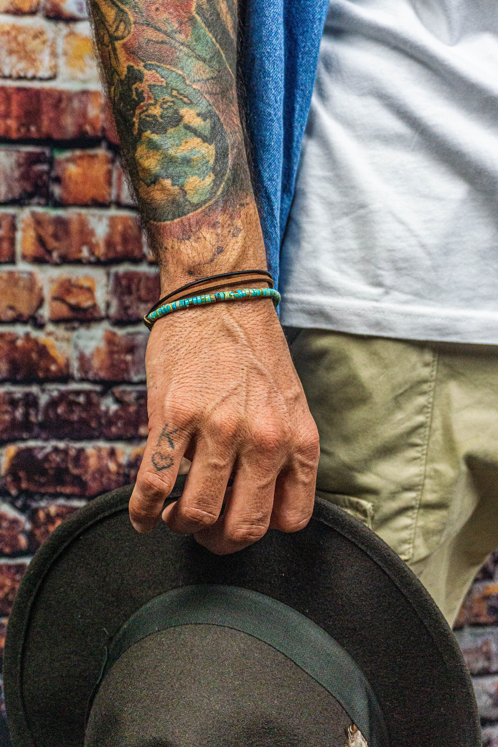 layered mens bracelet made of turquoise imperial jasper and leather