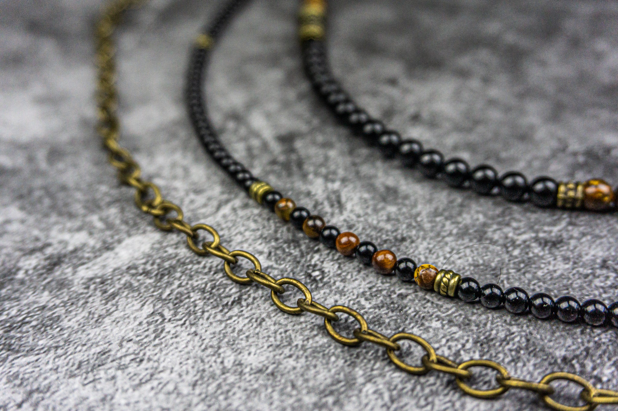 pants wallet keychain multistrand made of onyx and tiger eye beads and a bronze chain